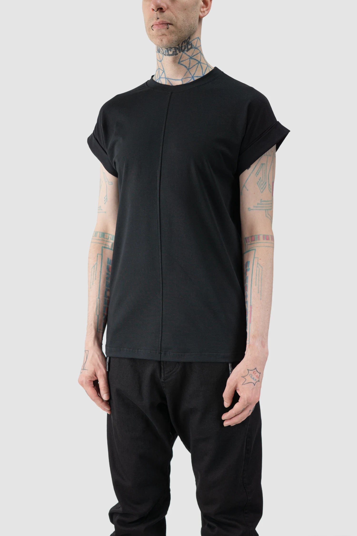 La Haine Inside Us - model front side view of men’s FW25 Black Front Seam Elastic Cotton T-Shirt