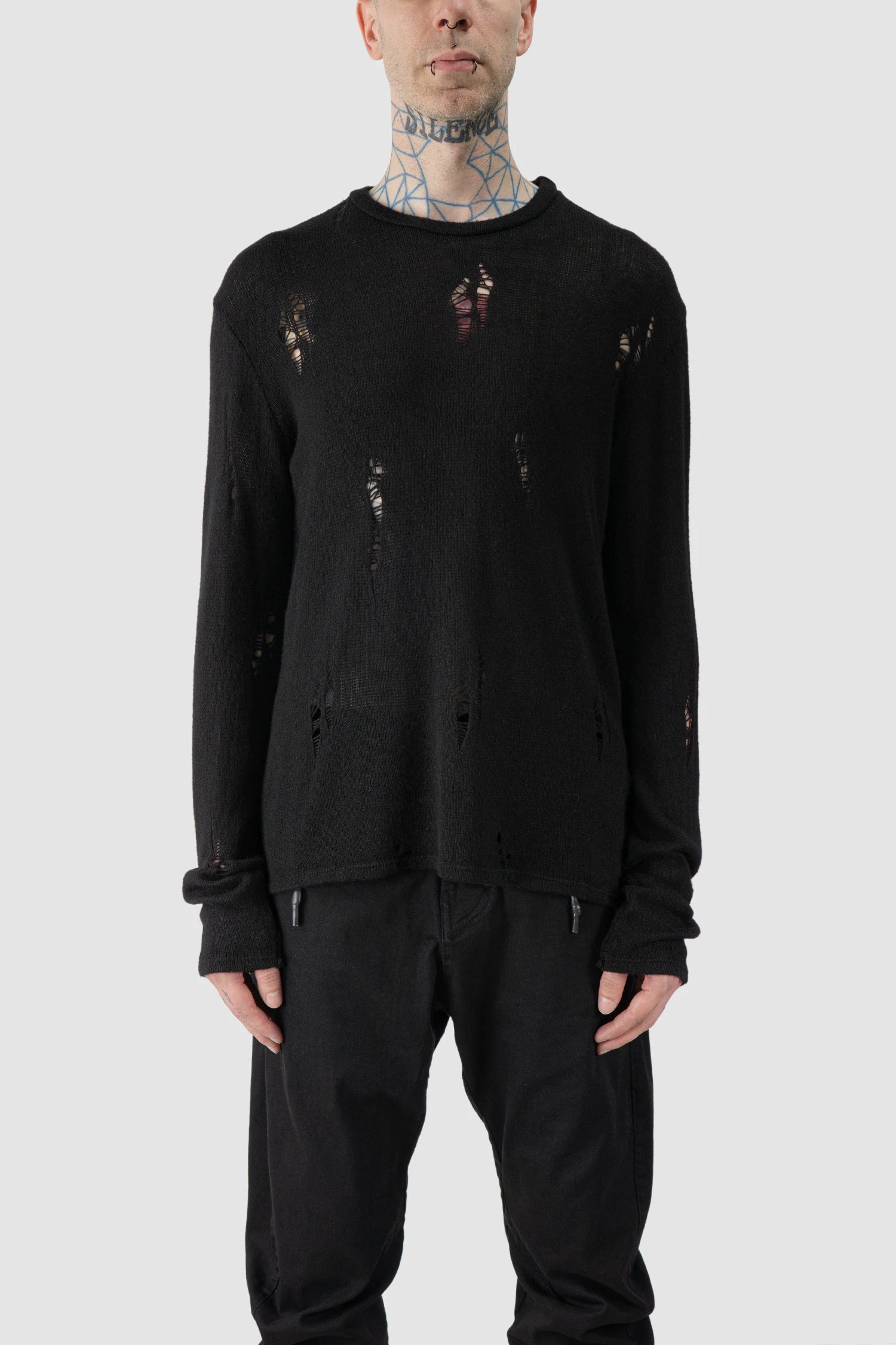 La Haine Inside Us - model front view of men’s FW25 Black Irregular Destroyed Viscose Blend Knit Sweatshirt