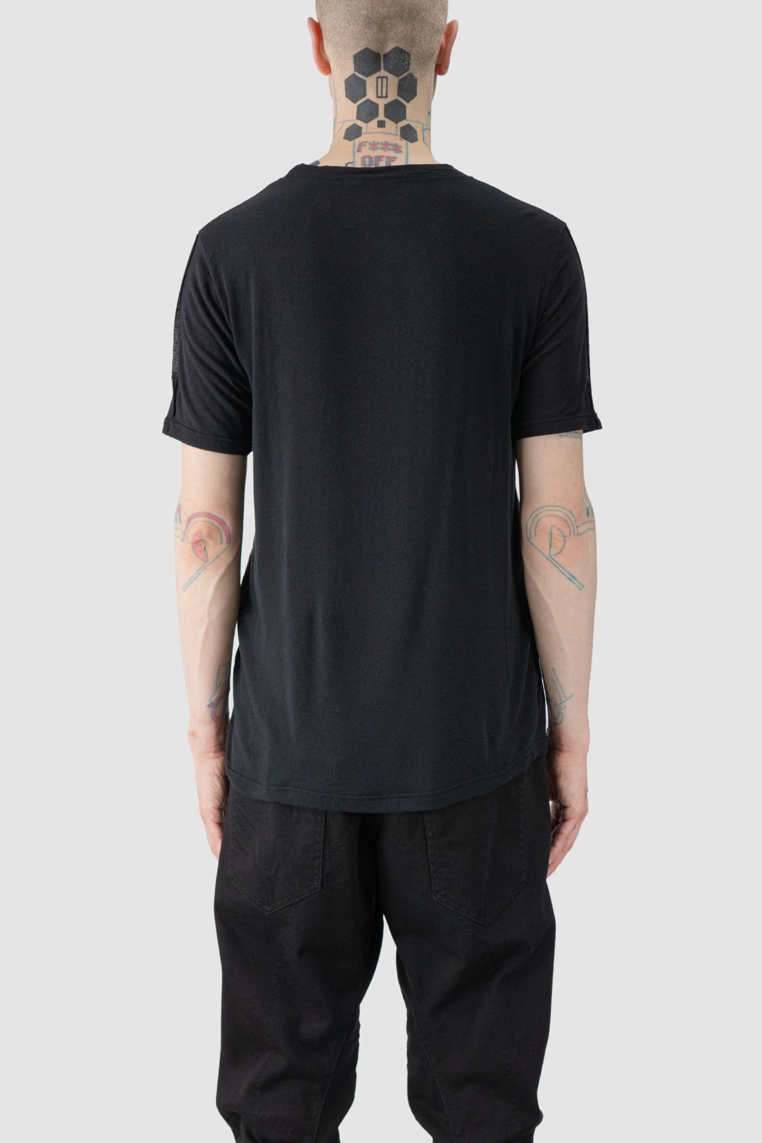 La Haine Inside Us - model back view of men’s FW25 Black Relaxed Cashmere Blend T-Shirt