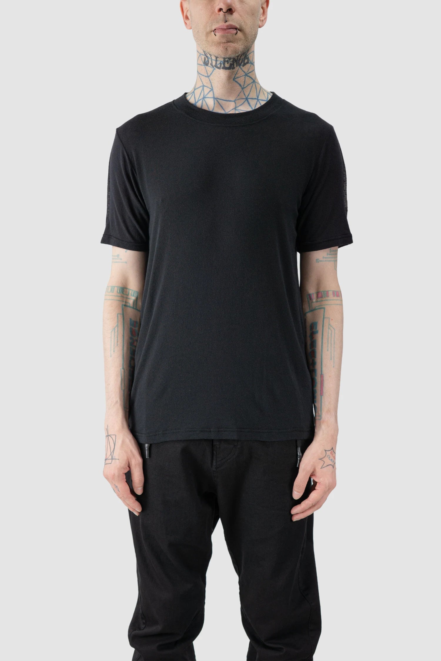 La Haine Inside Us - model front view of men’s FW25 Black Relaxed Cashmere Blend T-Shirt