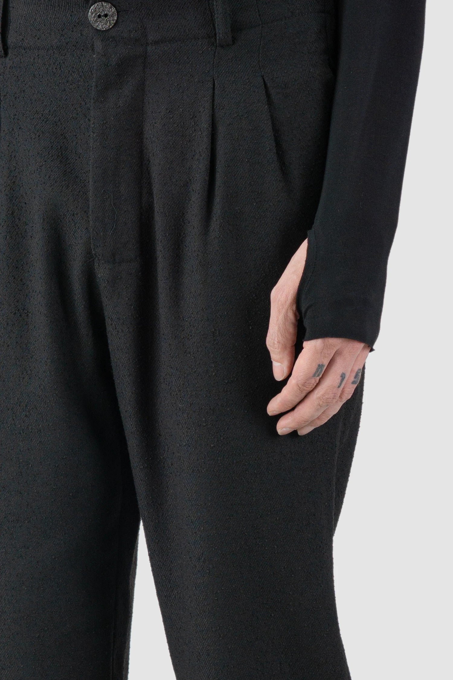 La Haine Inside Us - fabric detail view of FW25 Black Relaxed Soft Bouclé Trousers