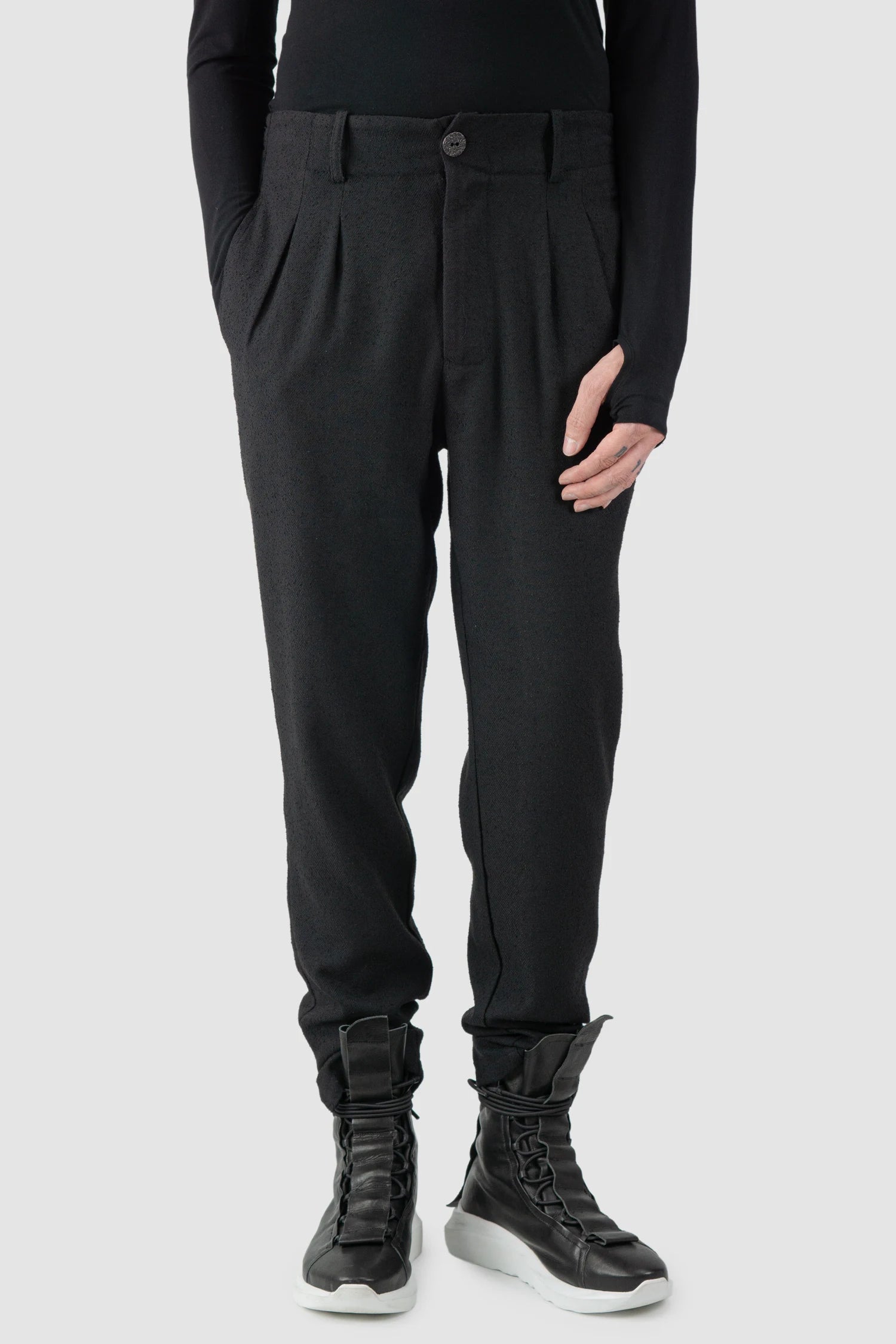 La Haine Inside Us - model front relaxed view of men’s FW25 Black Relaxed Soft Bouclé Trousers
