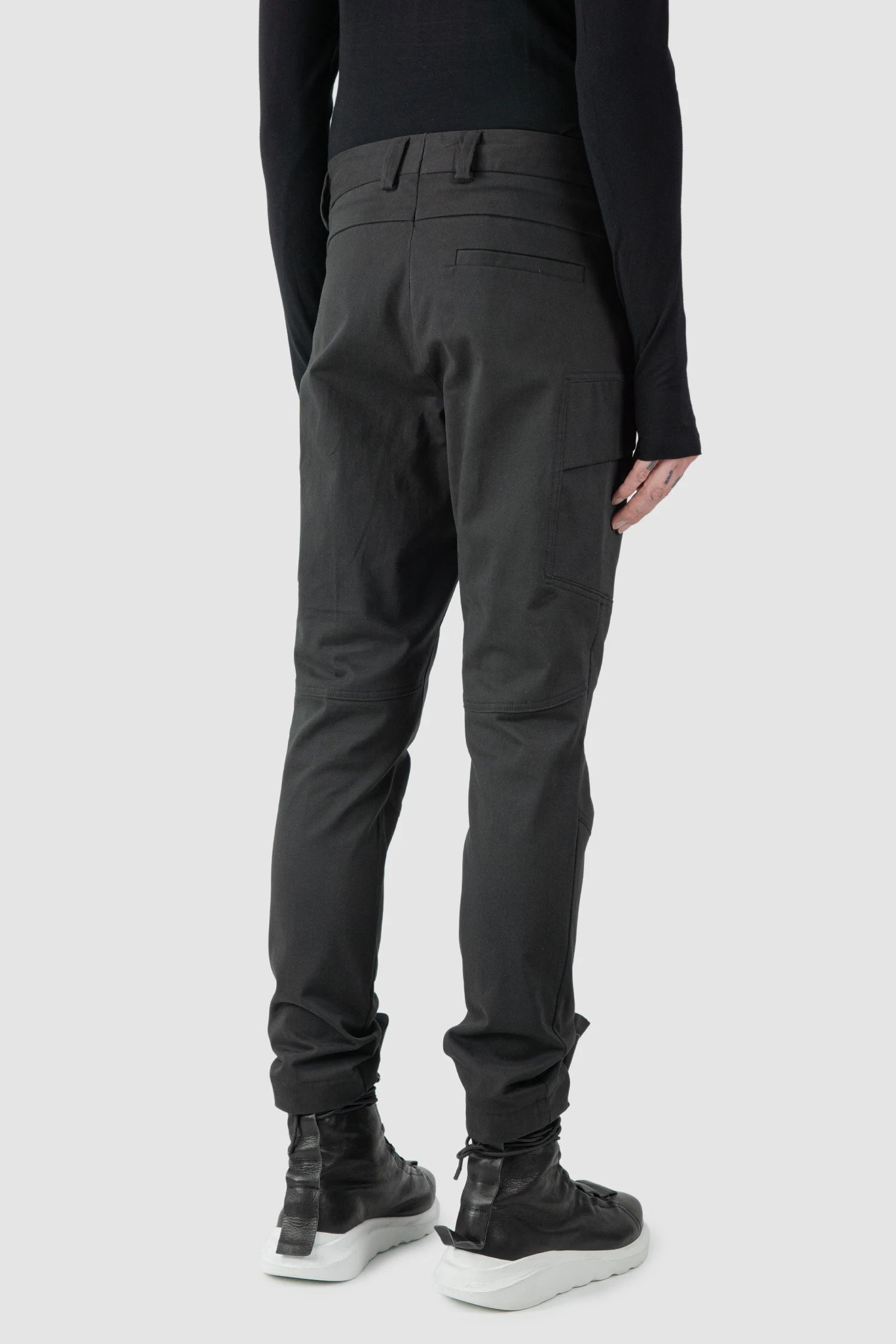 La Haine Inside Us - model back side view of men’s FW25 Black Slim Fit Stretch Cotton Cargo Trousers