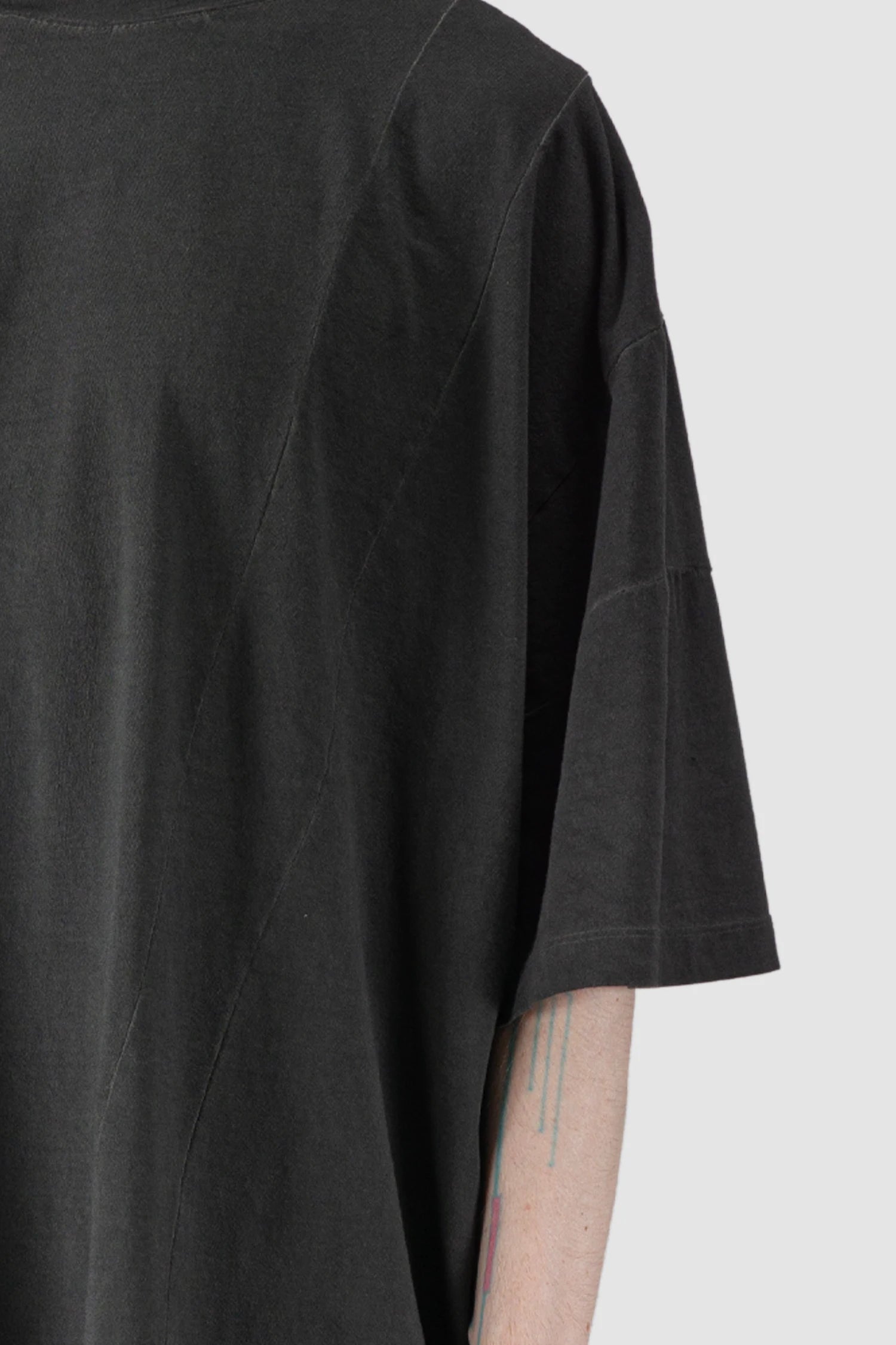 La Haine Inside Us - fabric close up view of men’s FW25 Grey Oversized Garment Dyed Cotton T-Shirt