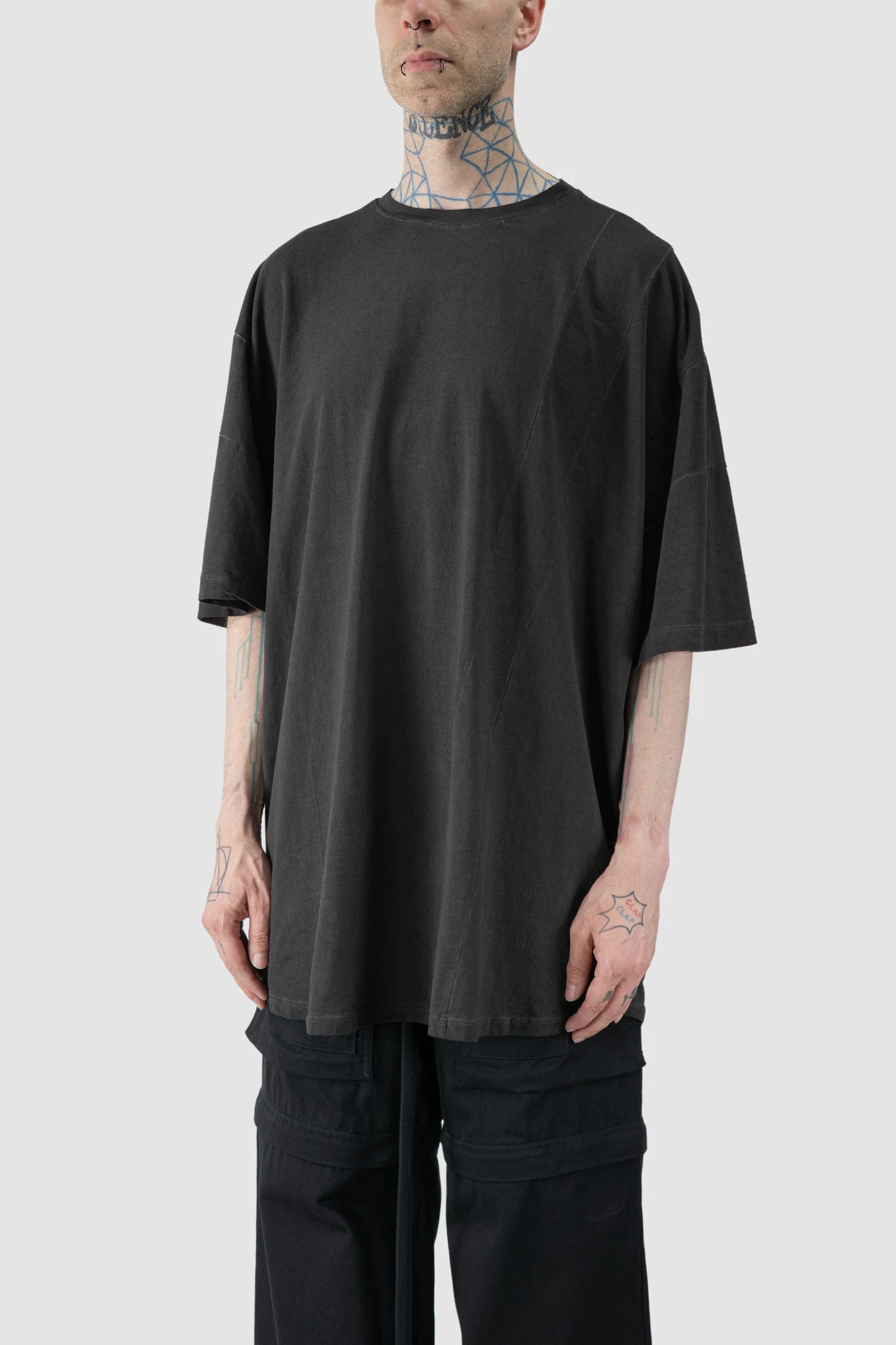 La Haine Inside Us - model front side view of men’s FW25 Grey Oversized Garment Dyed Cotton T-Shirt