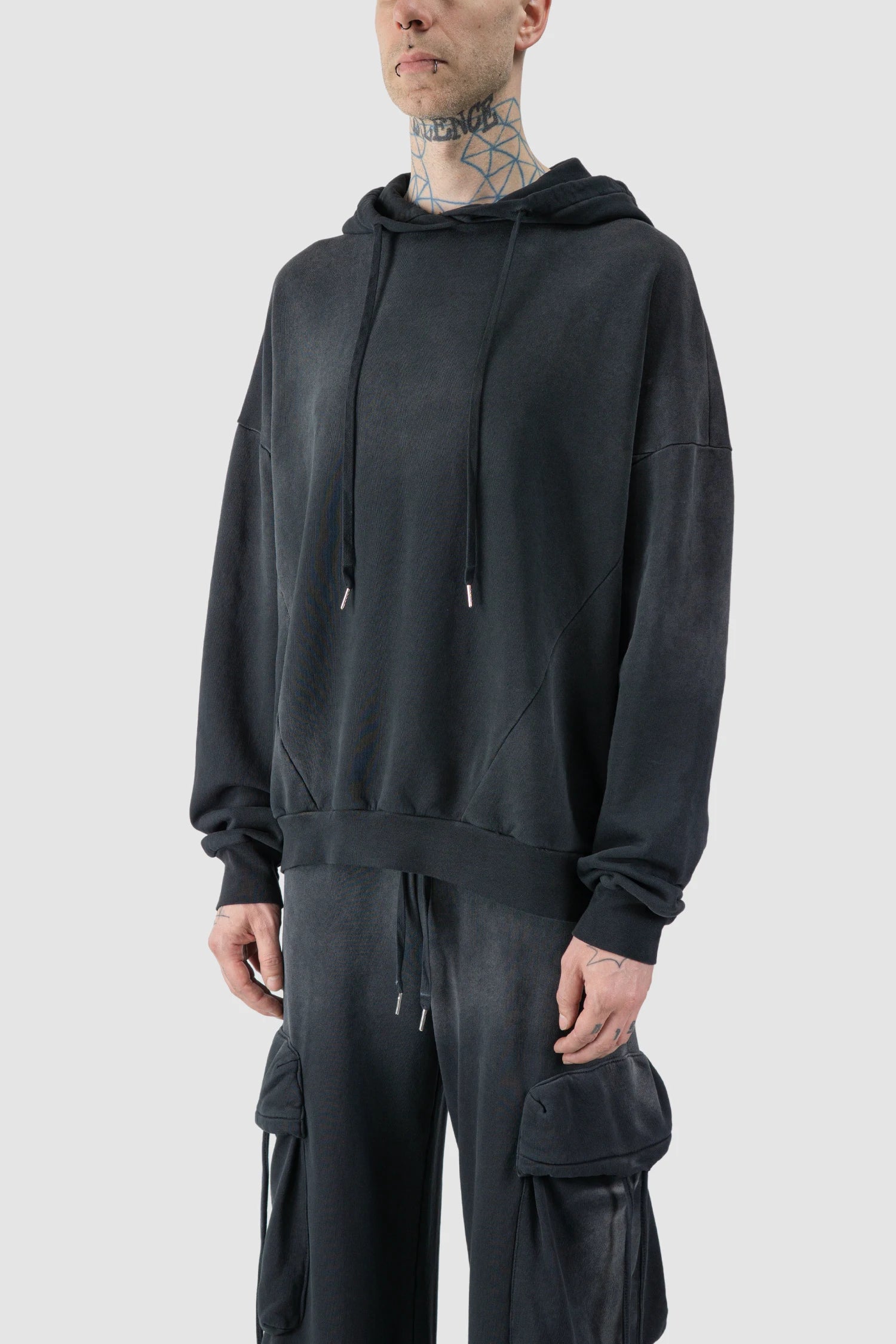 La Haine Inside Us - model side view of men’s FW25 Grey Sprayed Degrade Cotton Hooded Sweater