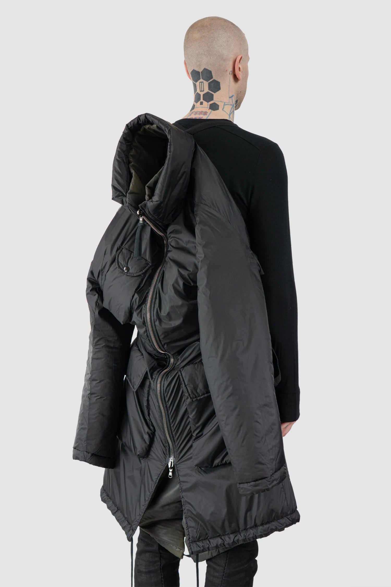 Masnada – Men's Black Reversible Thindown Parka - model carry back view Masnada – Men's Black Reversible Thindown Parka - model carry back view