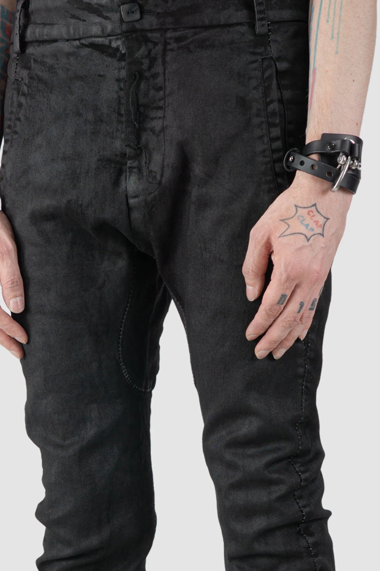 MD75 - fabric detail view of men’s Black Irregular Heavy Waxed Denim Jeans
