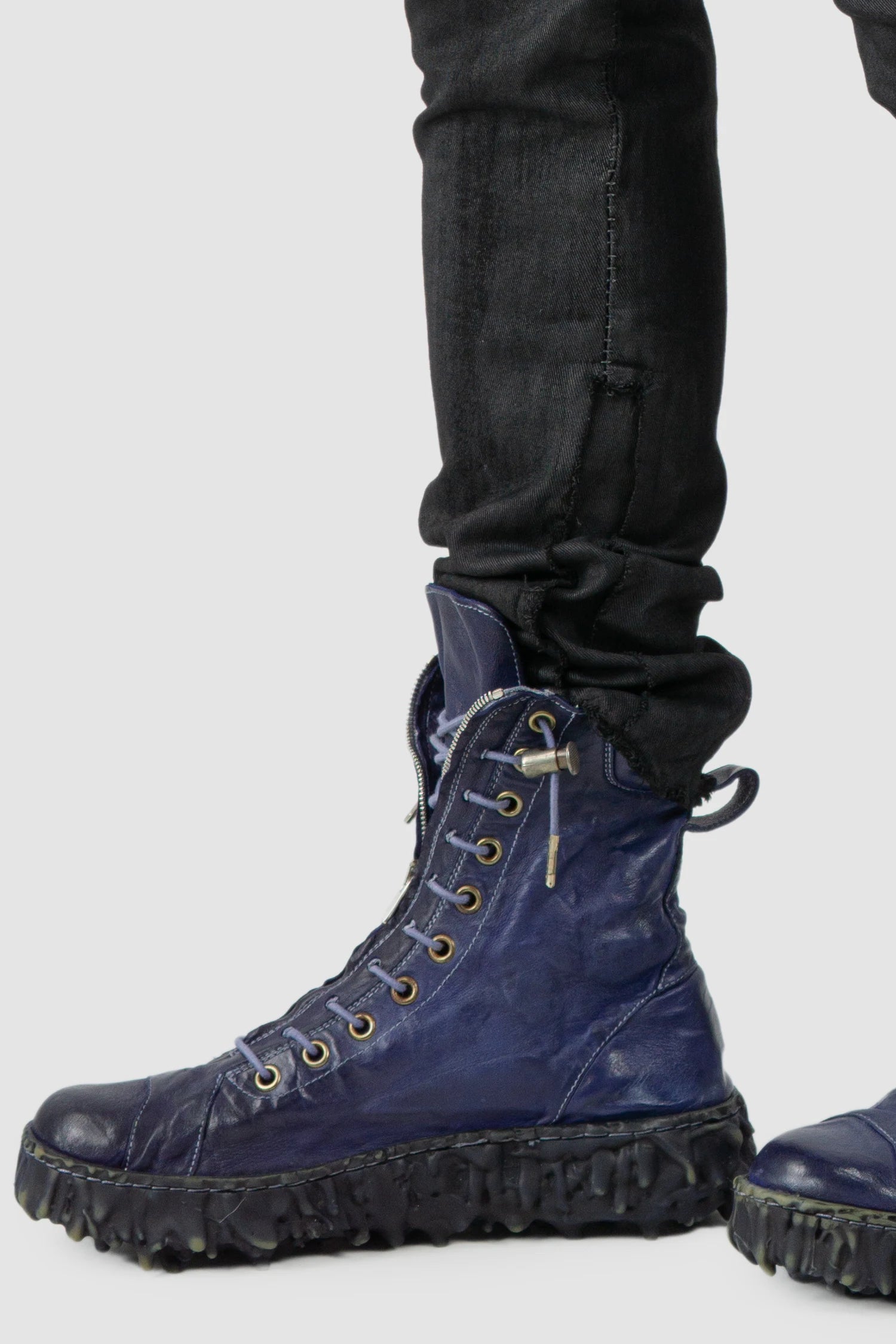 MD75 - hem detail view of men’s Black Irregular Heavy Waxed Denim Jeans