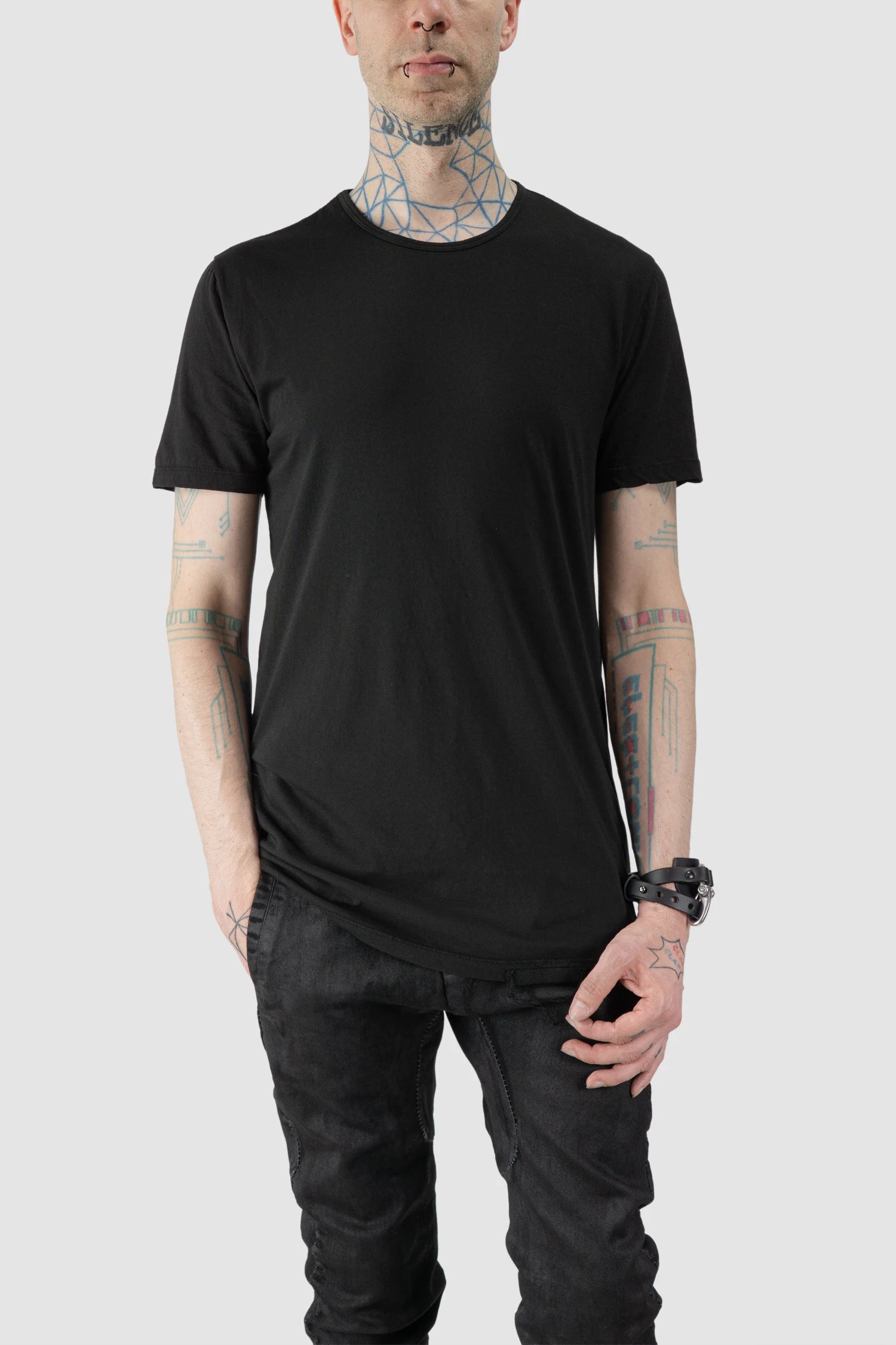 MD75 - model front relaxed view of men’s Black Short Sleeve T-Shirt with Knit Detail