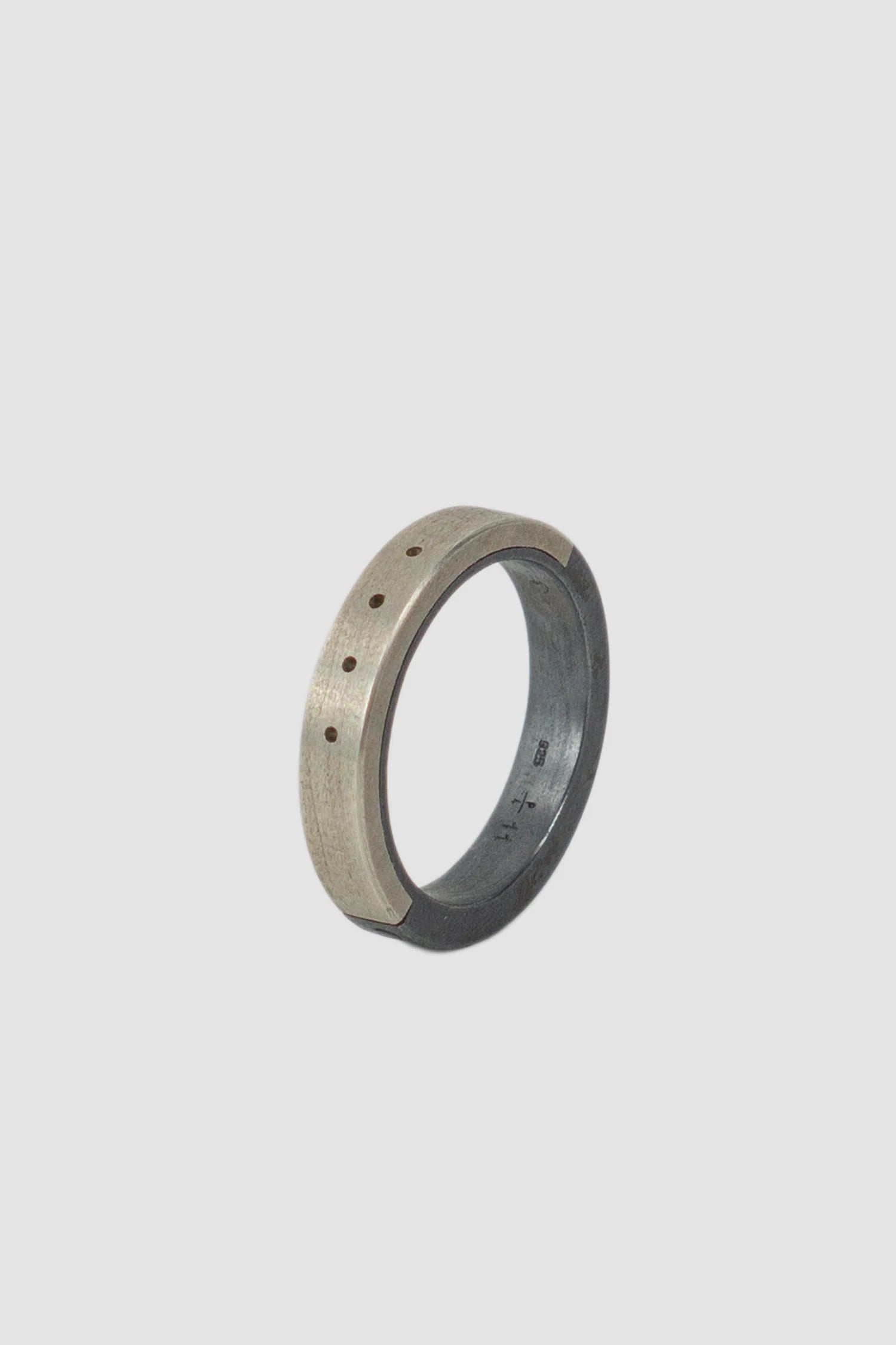 Parts of Four – Black Silver Dirty Sterling 4 Hole Sistema Ring 4 mm - standing left view Parts of Four – Black Silver Dirty Sterling 4 Hole Sistema Ring 4 mm - standing left view