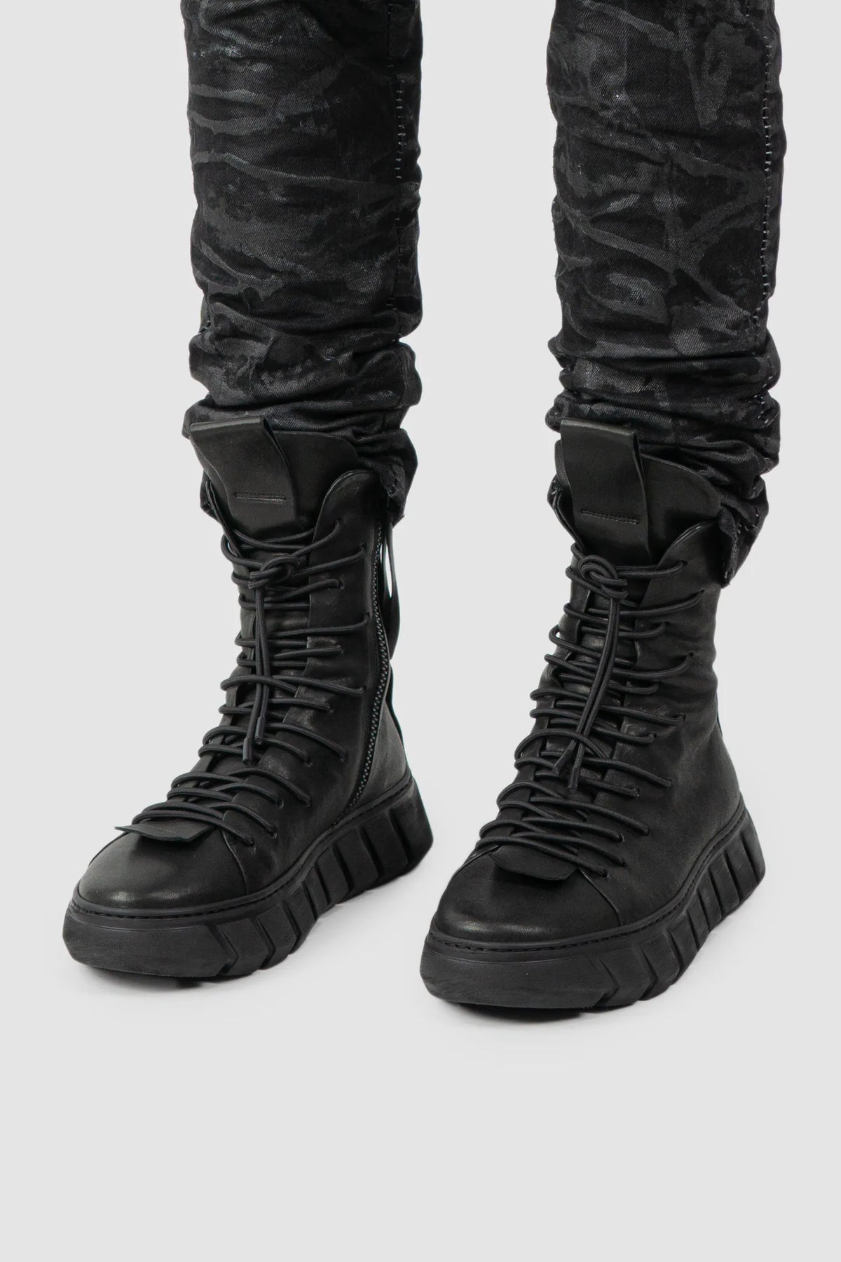 Puro Secret - Black Lamb Leather Sneaker Boots - Model front left view Puro Secret - Black Lamb Leather Sneaker Boots - Model front left view