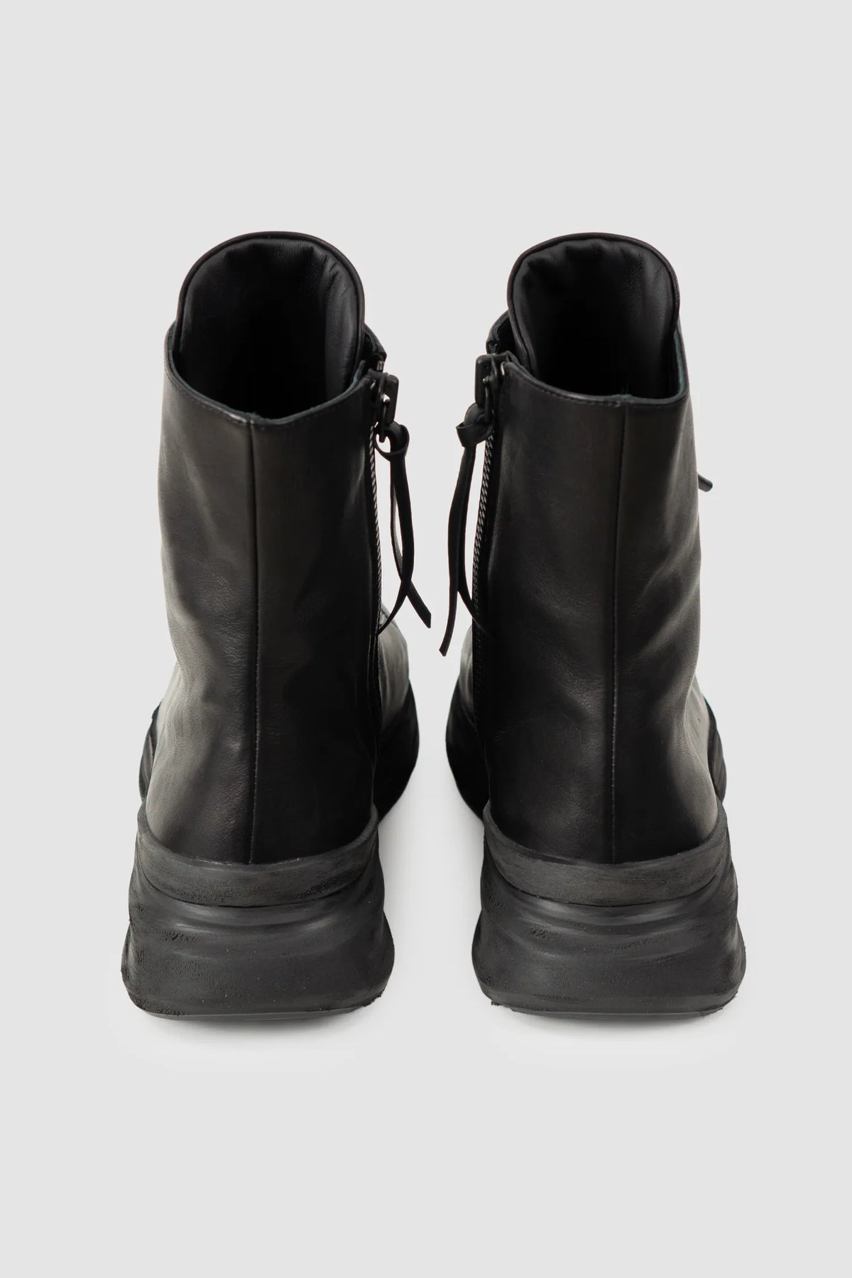 Puro Secret - Black Offset Leather High-Top Sneakers - Pair back view Puro Secret - Black Offset Leather High-Top Sneakers - Pair back view