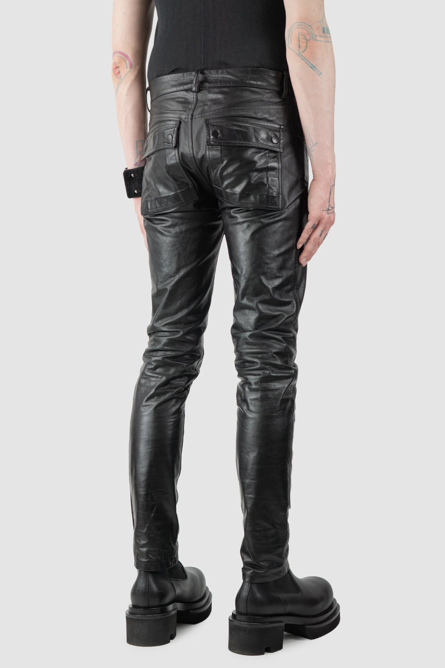 Rick Owens - Black Calf Leather Tyrone Jeans FW21 "Gethsemane" - model back side view Rick Owens - Black Calf Leather Tyrone Jeans FW21 "Gethsemane" - model back side view