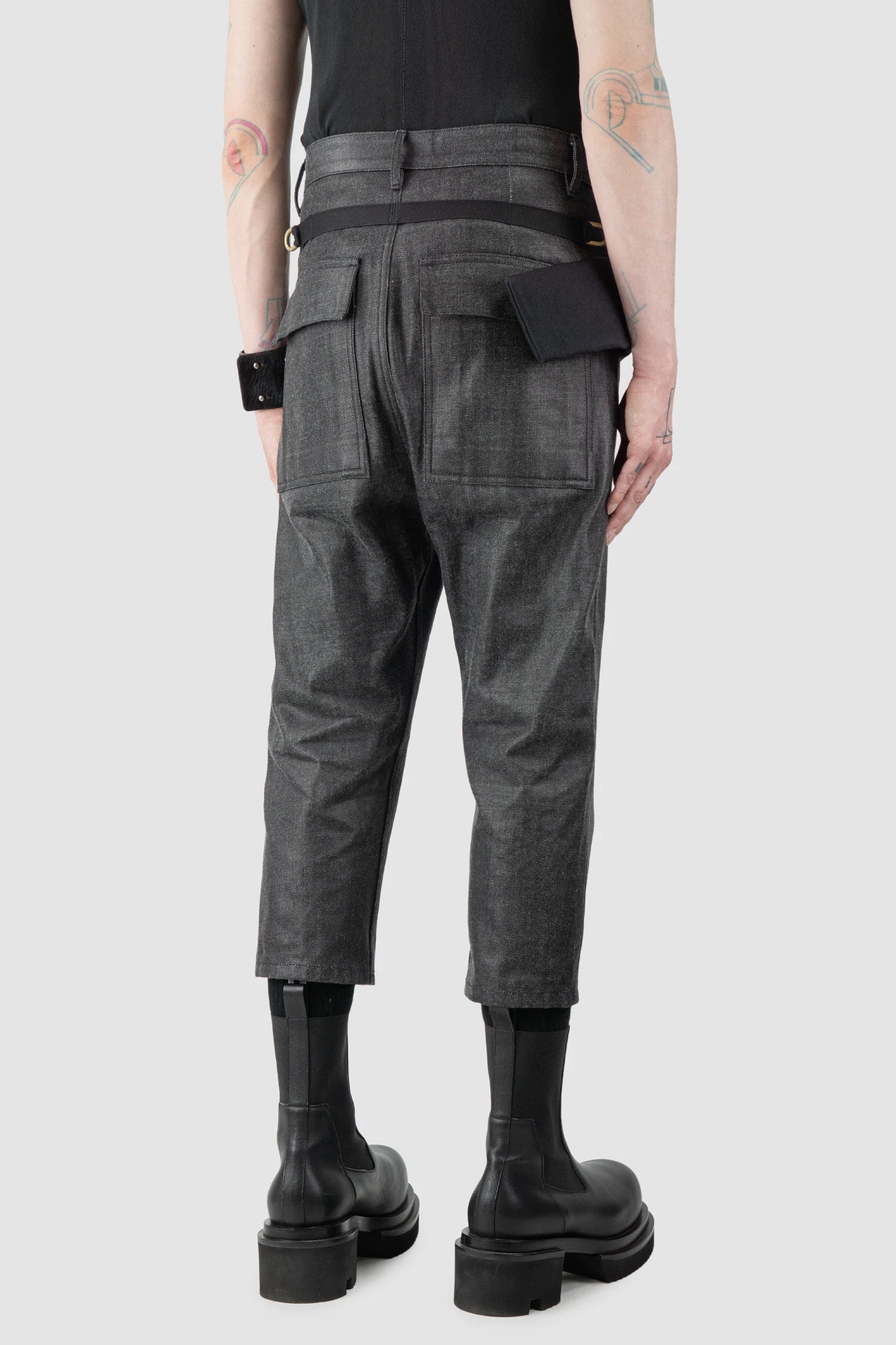 Rick Owens - Black Coated Belted Cropped Cargo Trousers FW17 "Glitter" - model back side view Rick Owens - Black Coated Belted Cropped Cargo Trousers FW17 "Glitter" - model back side view