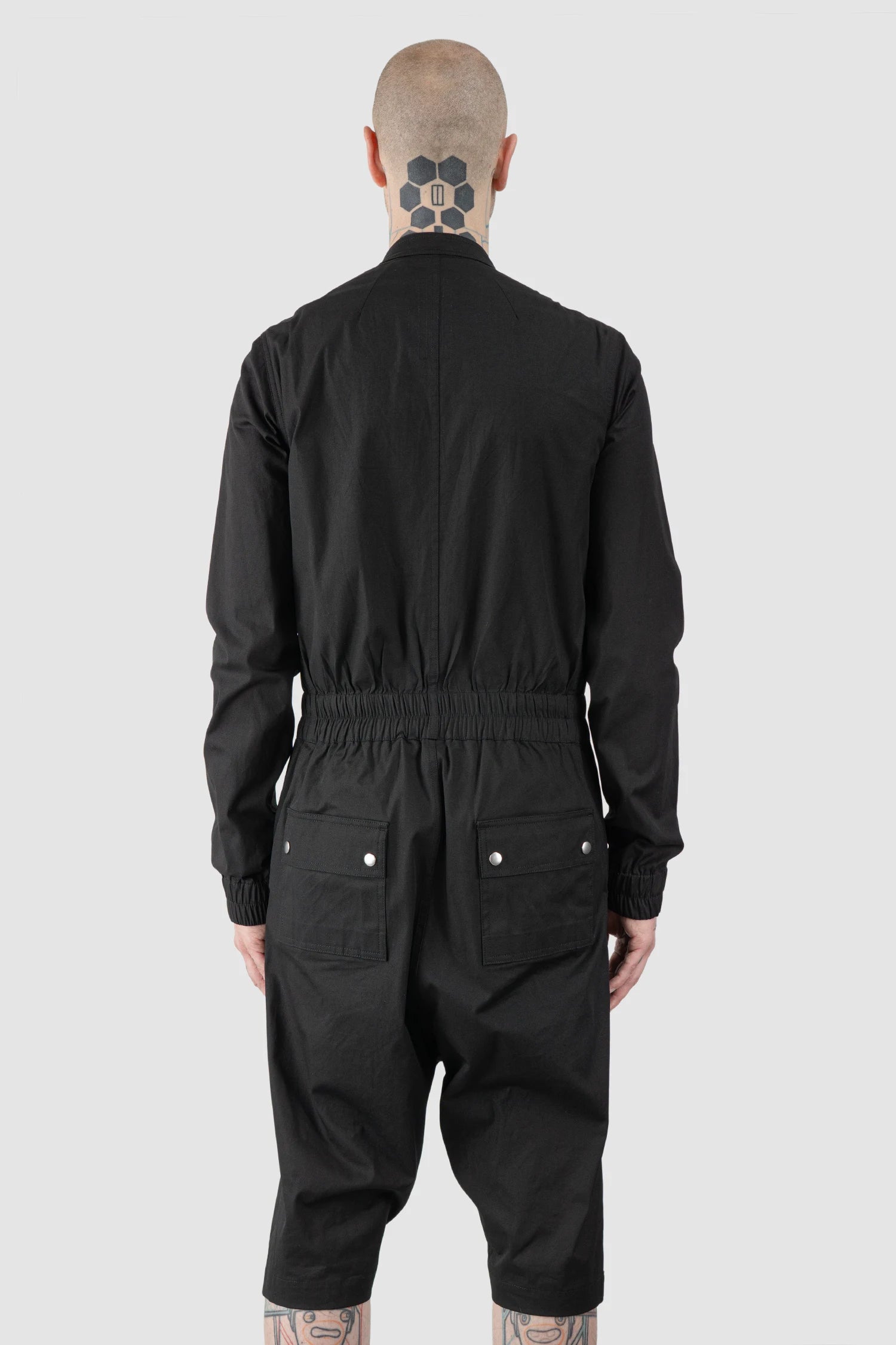 Rick Owens - Black Short Gary Flightsuit SS21 "Phlegeton" - model back view Rick Owens - Black Short Gary Flightsuit SS21 "Phlegeton" - model back view