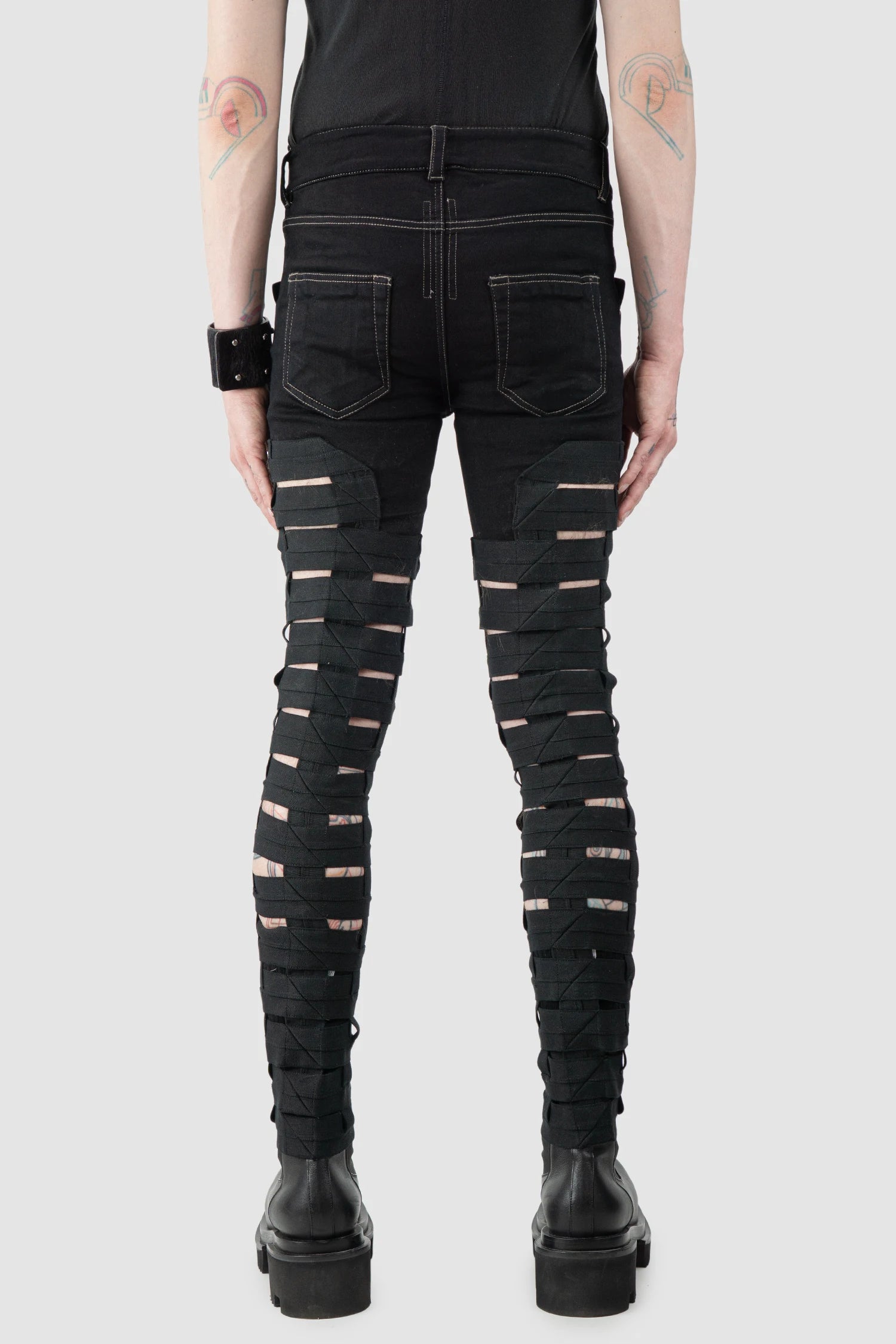 Rick Owens - Black Spartan Jeans SS22 "Fogachine" - model back view Rick Owens - Black Spartan Jeans SS22 "Fogachine" - model back view