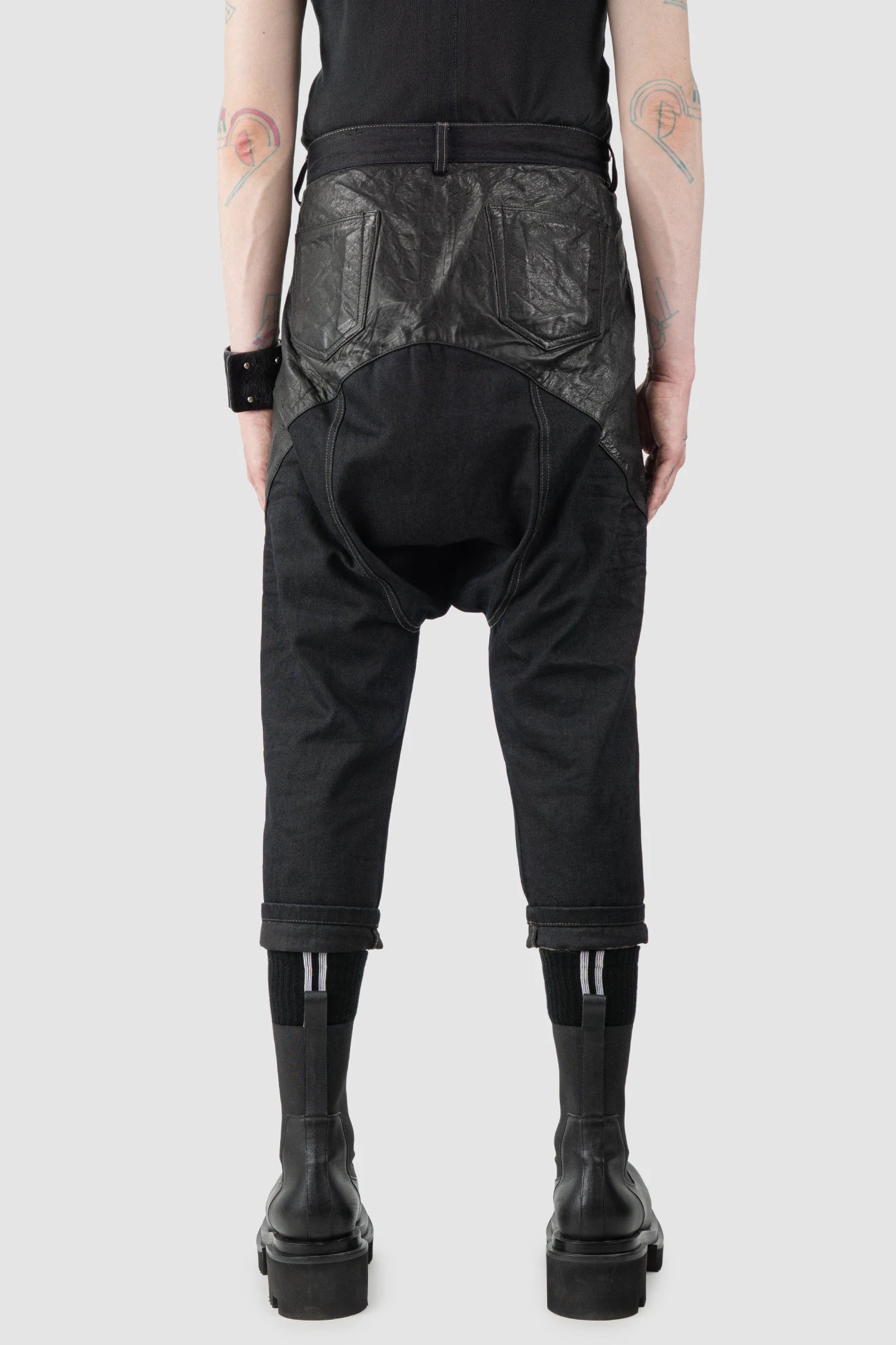 Rick Owens DRKSHDW - Black Calf Leather Patch Cropped Denim Jeans "Archive" - model back view Rick Owens DRKSHDW - Black Calf Leather Patch Cropped Denim Jeans "Archive" - model back view