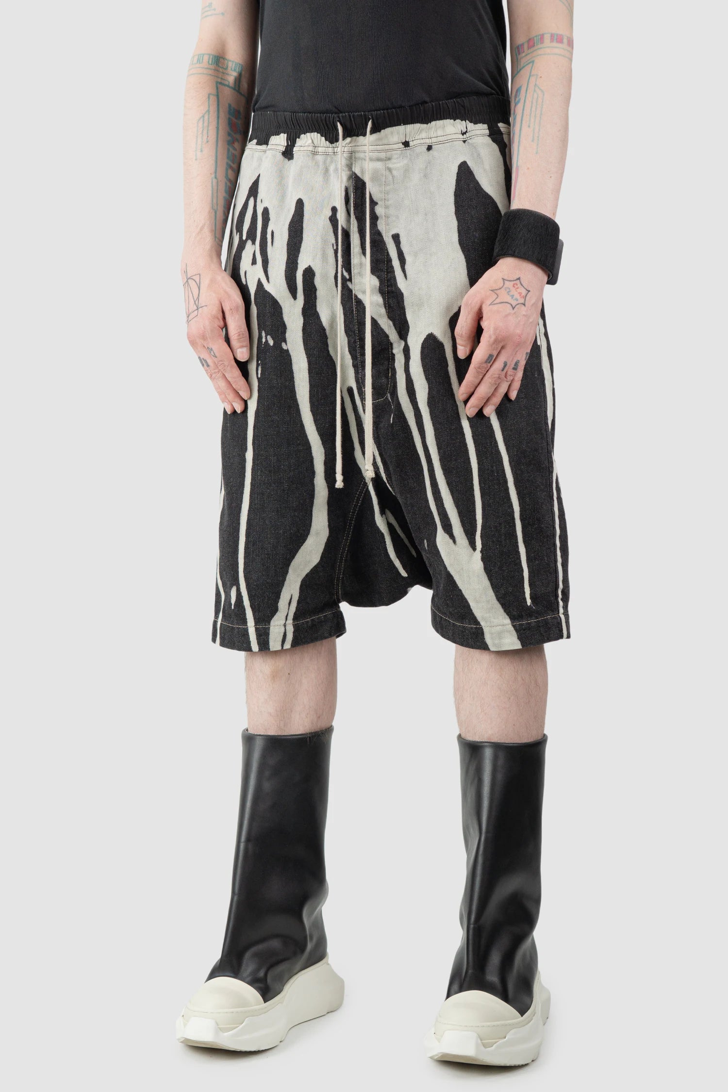 Rick Owens - Vomit Bleached Denim Pod Shorts FW16 "Mastodon" - model front side view Rick Owens - Vomit Bleached Denim Pod Shorts FW16 "Mastodon" - model front side view