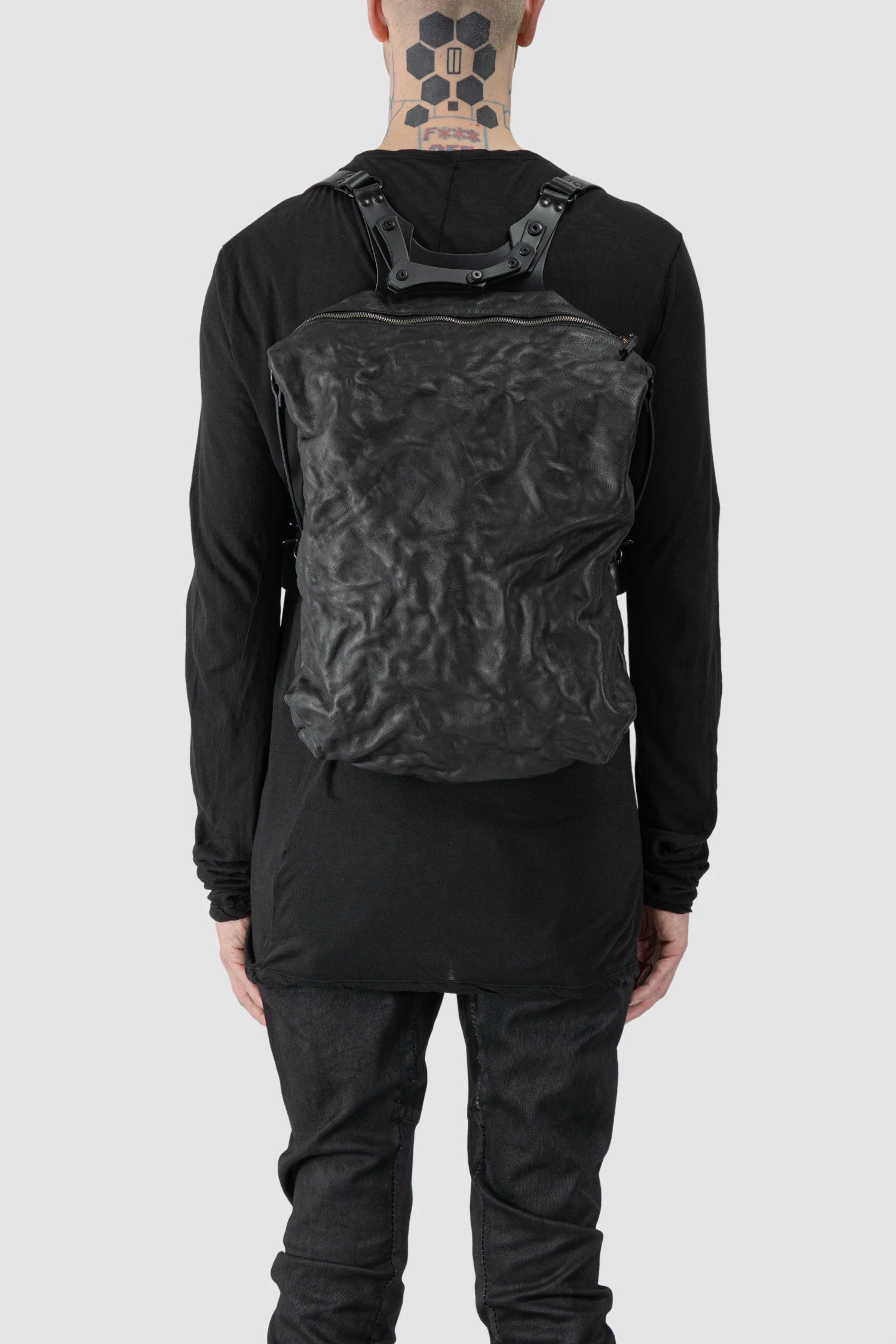 TEO NG - NIKS - model back view of men’s Black Crinkled Leather Backpack