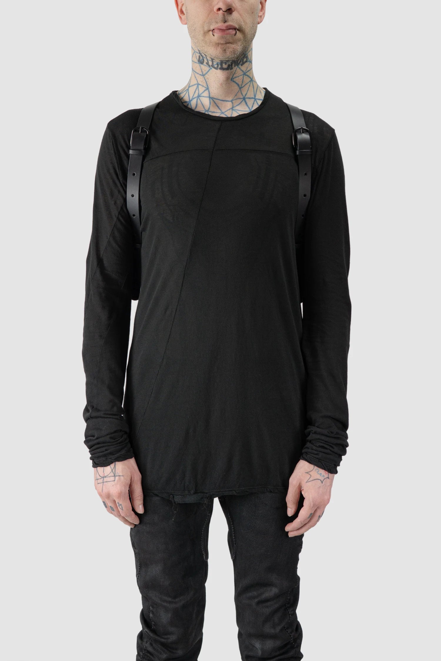 TEO NG - NIKS - model front view of men’s Black Crinkled Leather Backpack