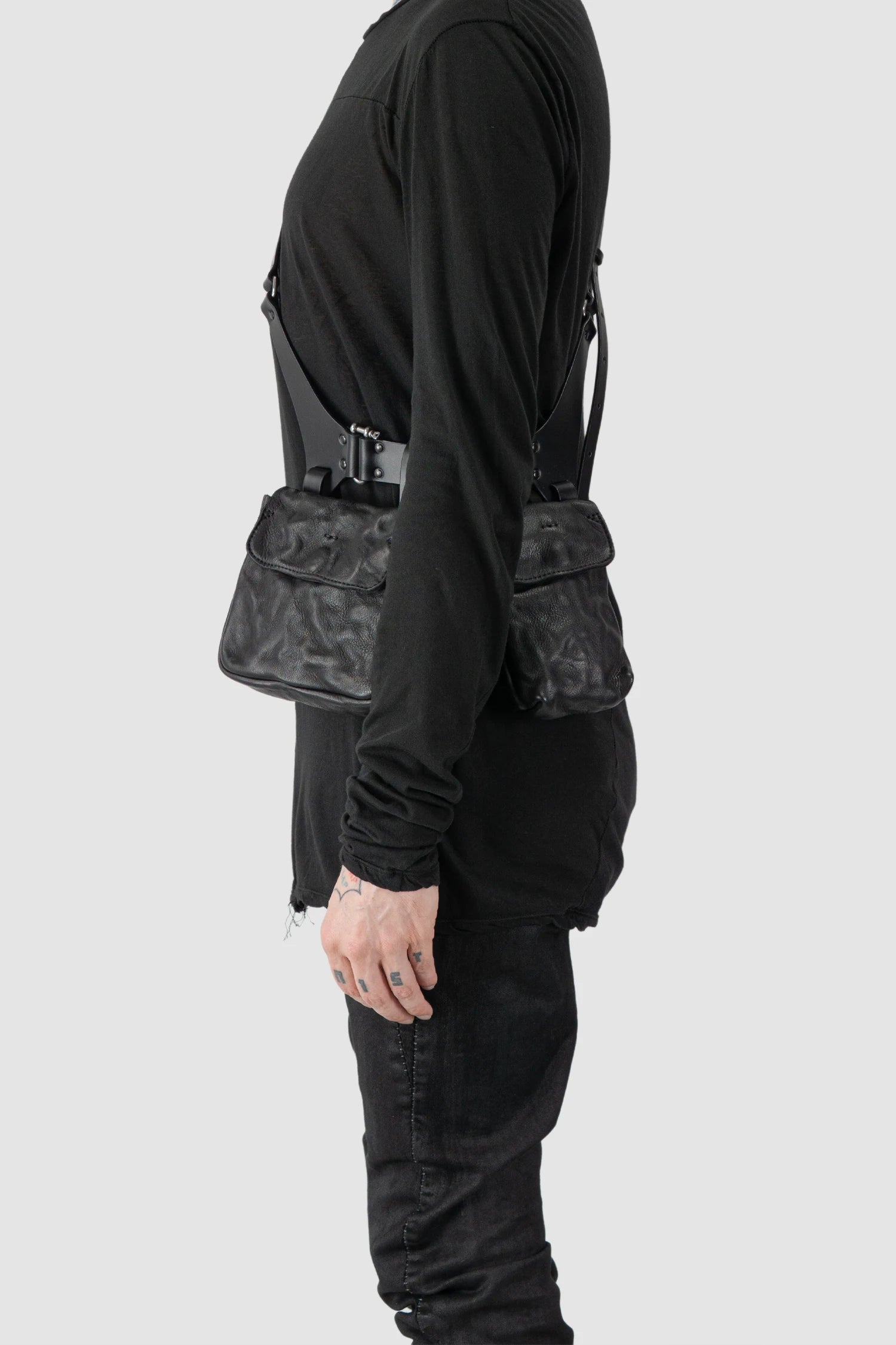 TEO NG - MOO - model front left view of men’s Black Leather Crossbody Double Pouch Bag