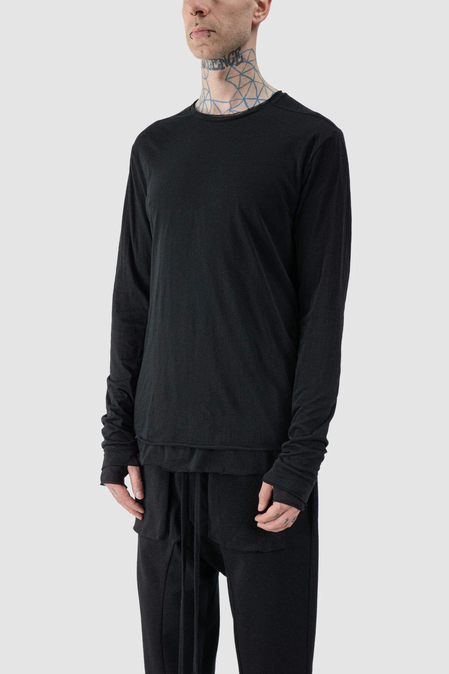 Thom Krom - model front side view of Black 2-in-1 Long Sleeve Cotton T-Shirt