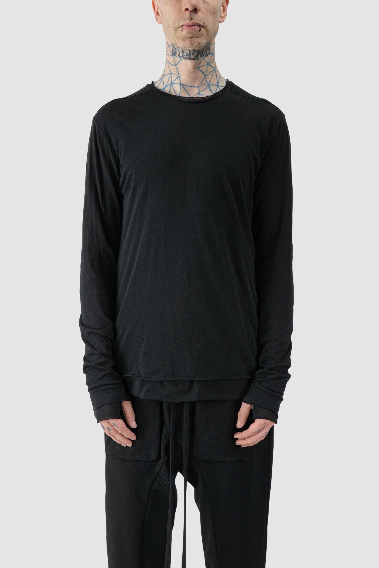 Thom Krom - model front view of Black 2-in-1 Long Sleeve Cotton T-Shirt