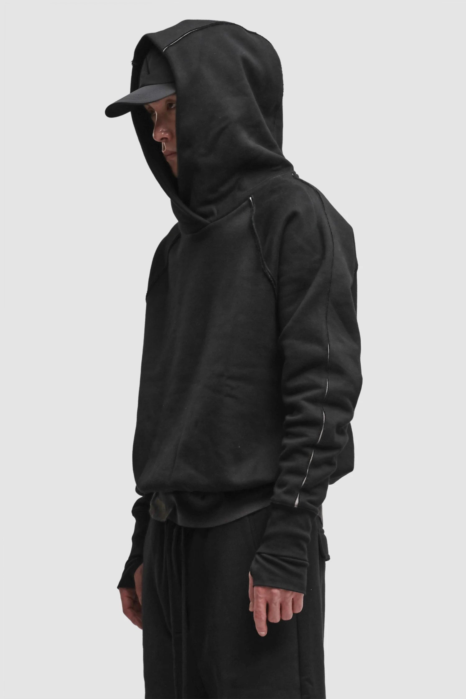 Thom Krom - Men’s Black Contrast Line Cotton Hoodie M-S-193 model side view Thom Krom - Men’s Black Contrast Line Cotton Hoodie M-S-193 model side view