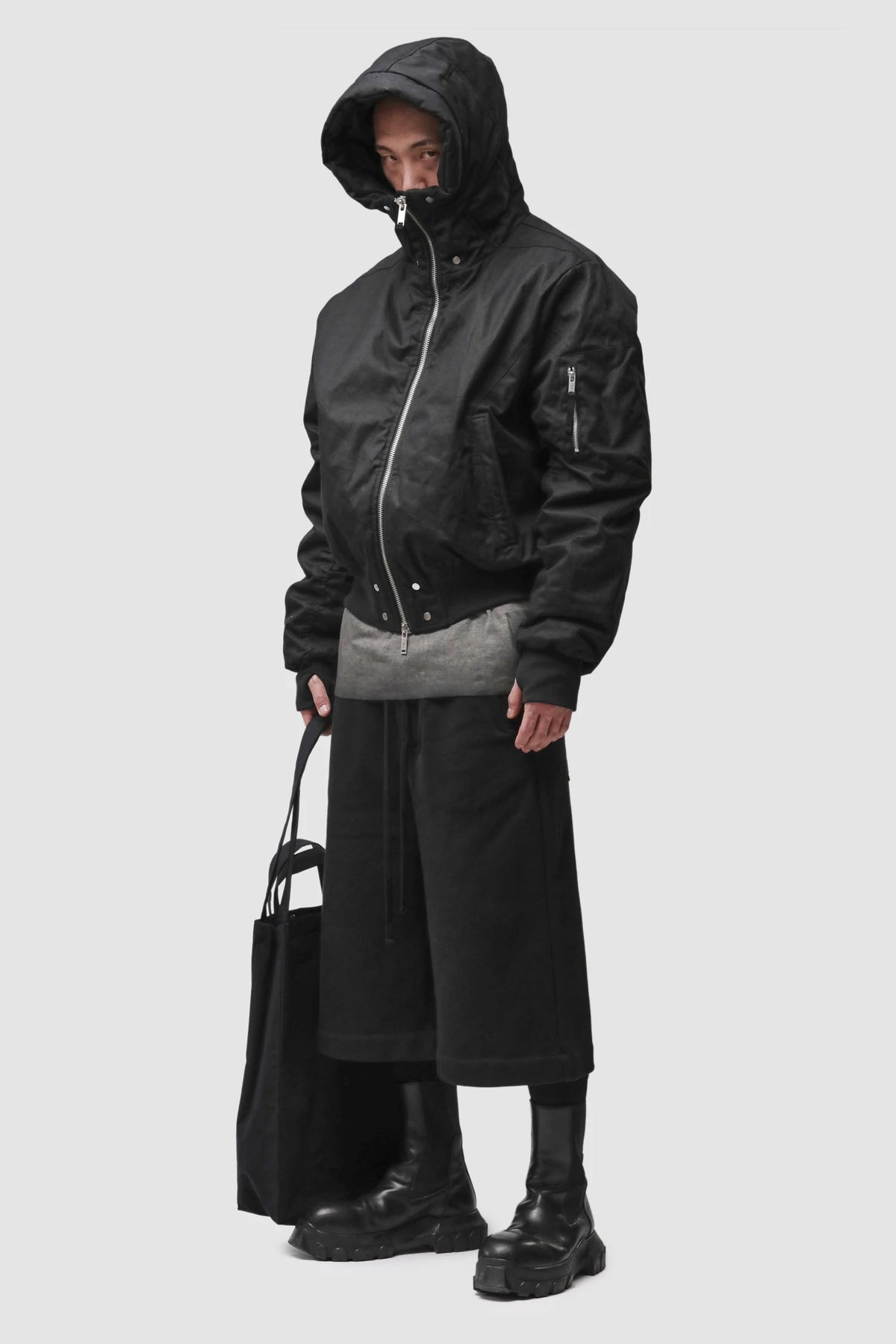 Thom Krom - Men’s Black Hooded Cotton Bomber Jacket M-J-89 model relaxed view Thom Krom - Men’s Black Hooded Cotton Bomber Jacket M-J-89 model relaxed view