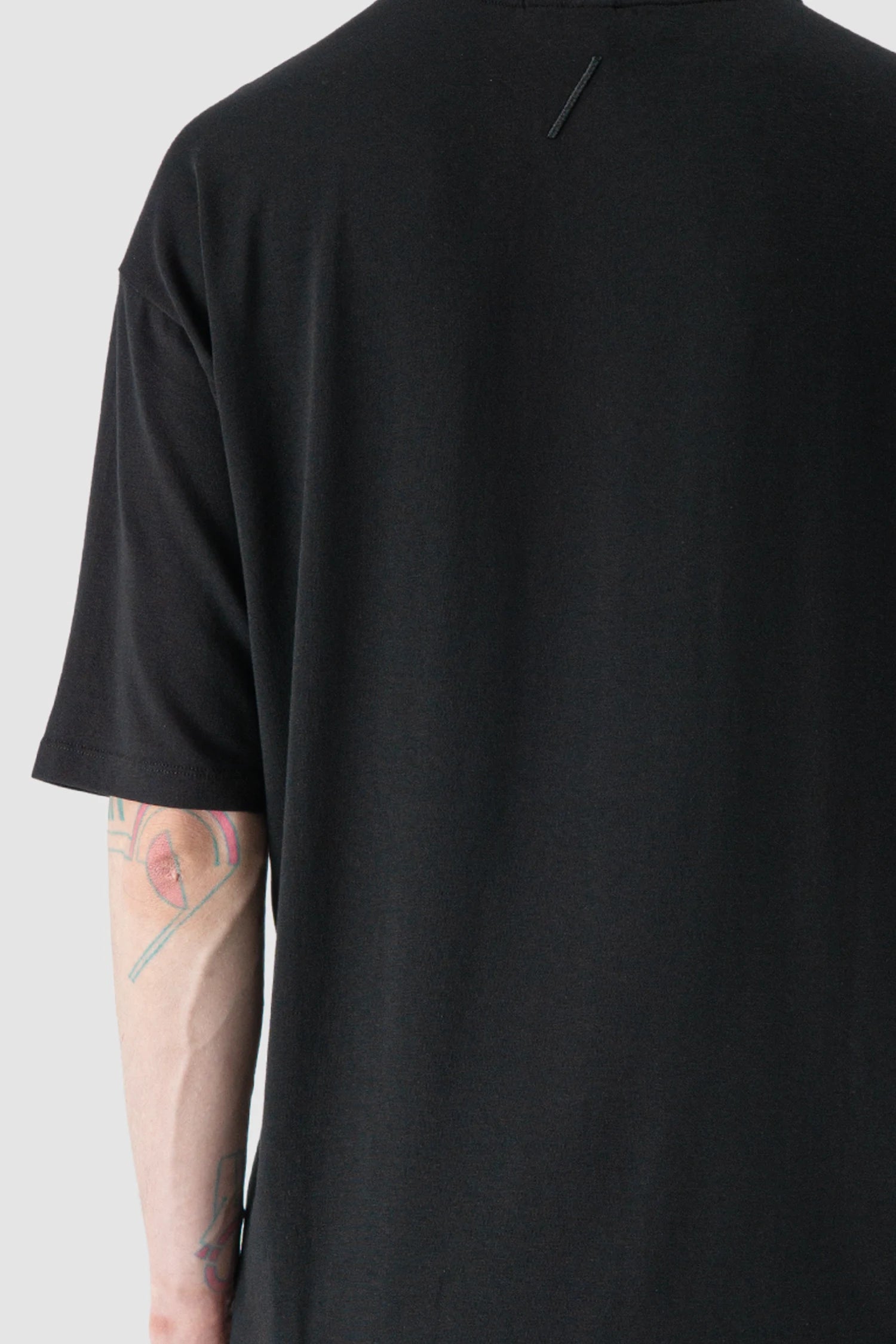 Thom Krom - model back detail view of Black Oversized Raglan Sleeve Modal Jersey T-Shirt