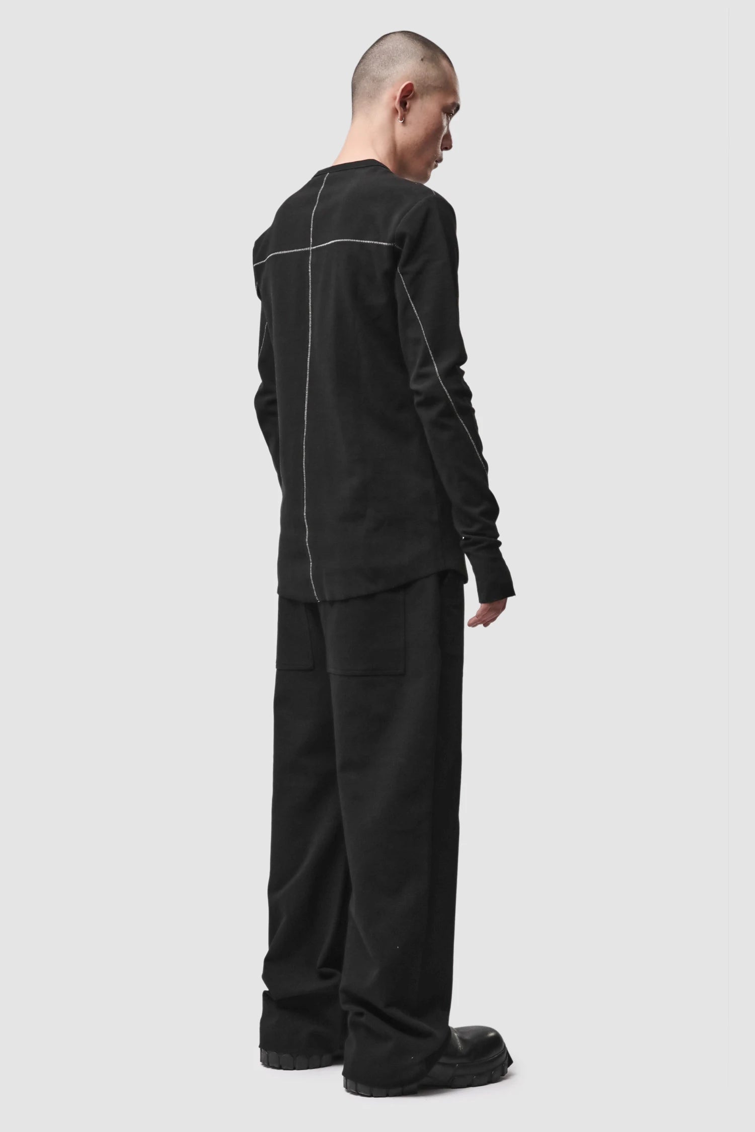 Thom Krom - Men’s Black Structured Cotton Contrast Stitch Long Sleeve M-TS-1001 model full side view Thom Krom - Men’s Black Structured Cotton Contrast Stitch Long Sleeve M-TS-1001 model full side view