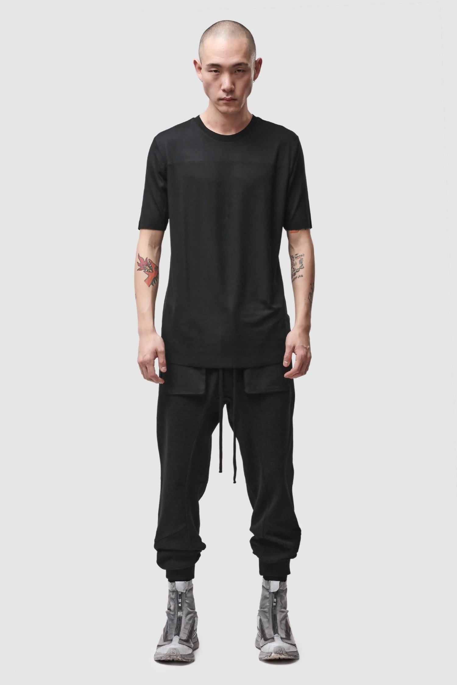 Thom Krom - Men’s Black Viscose Scar Stitch T-Shirt M-TS-973 model full front view Thom Krom - Men’s Black Viscose Scar Stitch T-Shirt M-TS-973 model full front view