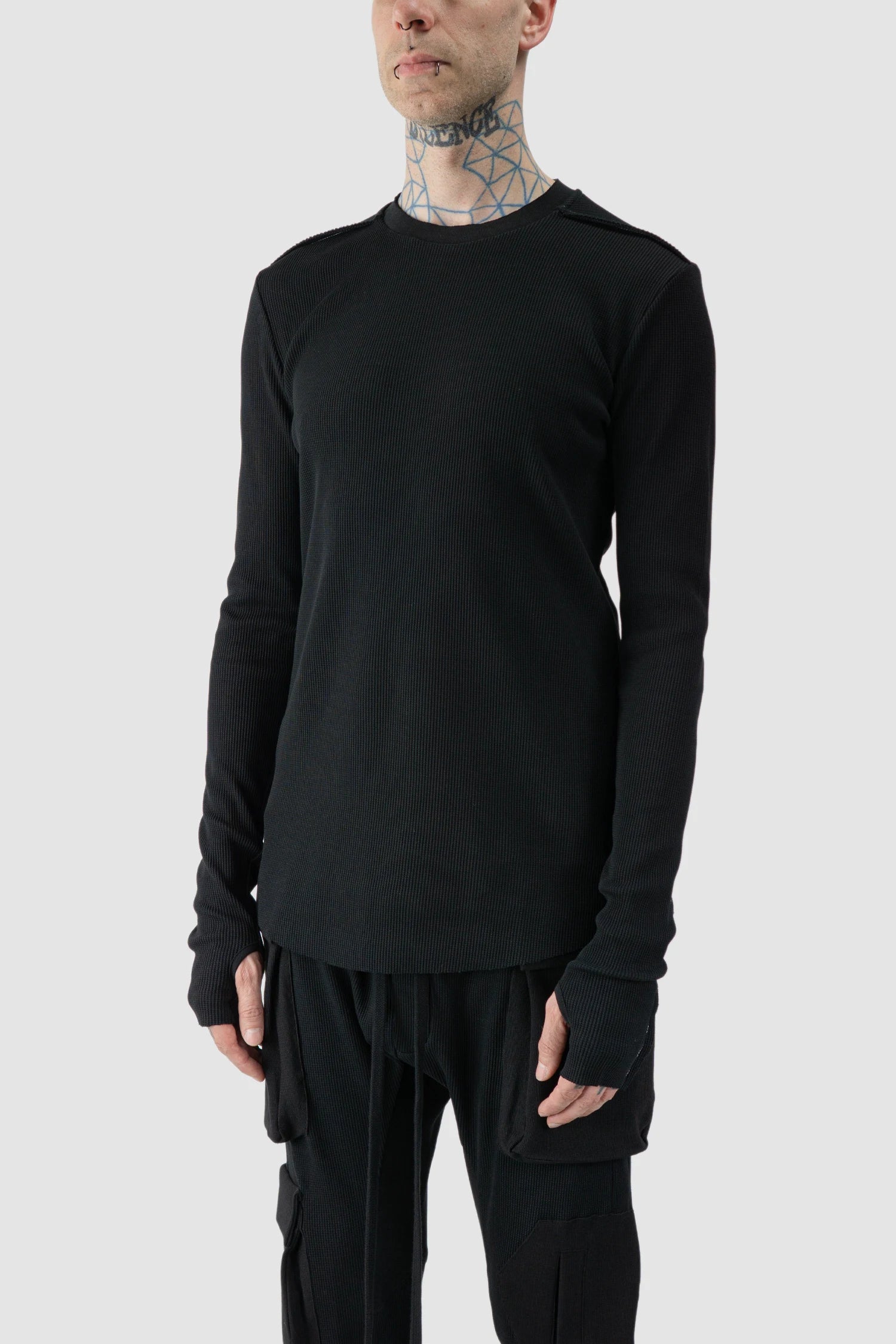 Thom Krom - model front side view of black Contrast Stitch Long Sleeve Cotton T-Shirt - M-TS-898