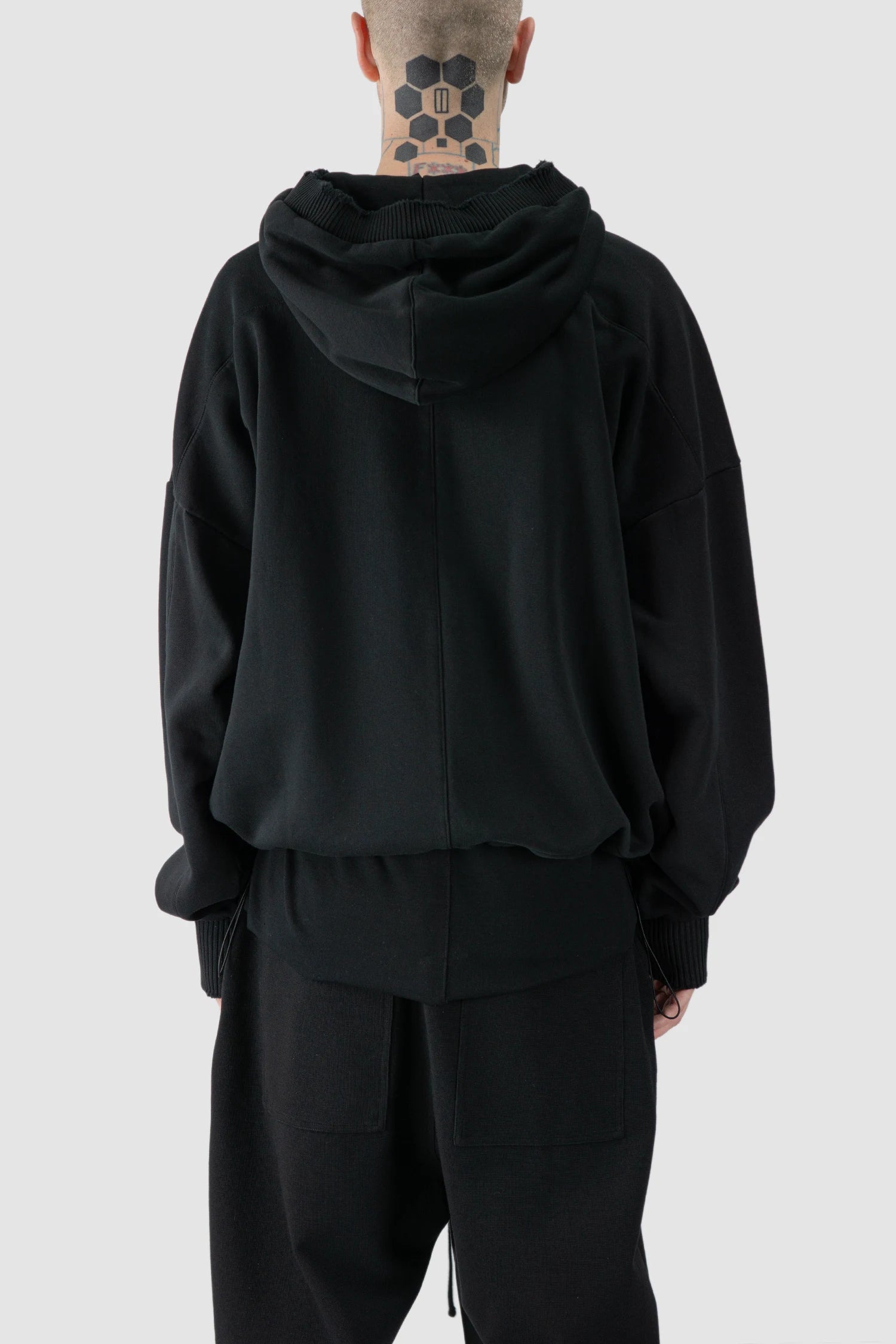 Thom Krom - model back view of black Cropped Cotton Hooded Sweater - M-S-186