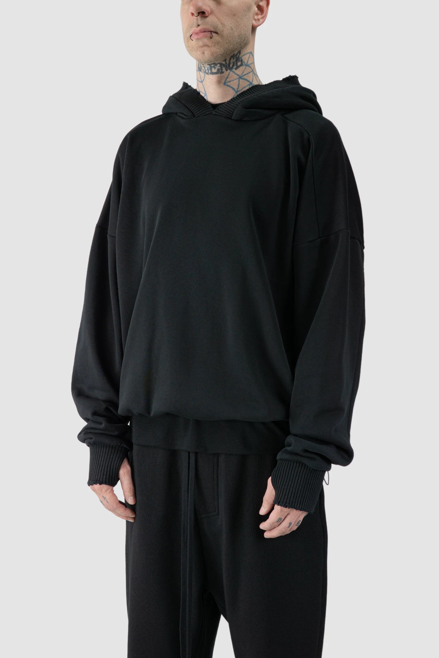 Thom Krom - model front side view of black Cropped Cotton Hooded Sweater - M-S-186