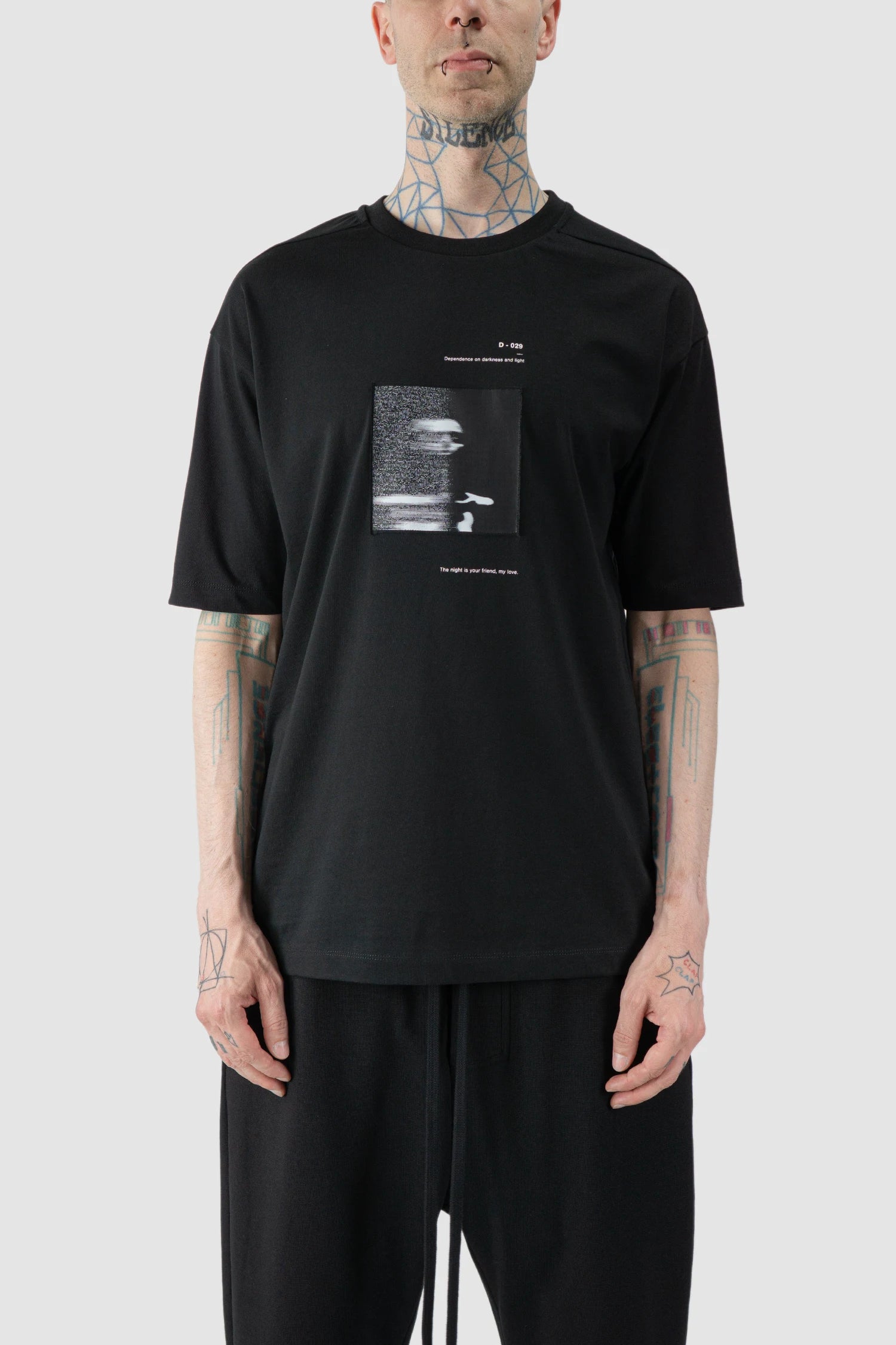 Thom Krom - model front view of black Loose Fit Cotton T-Shirt with Patch - M-TS-876