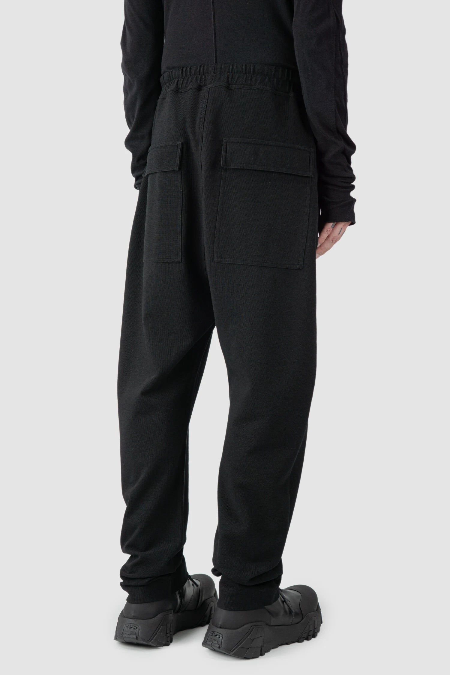 Thom Krom - model back side view of black Loose Fit Straight Leg Cotton Trousers - M-ST-503