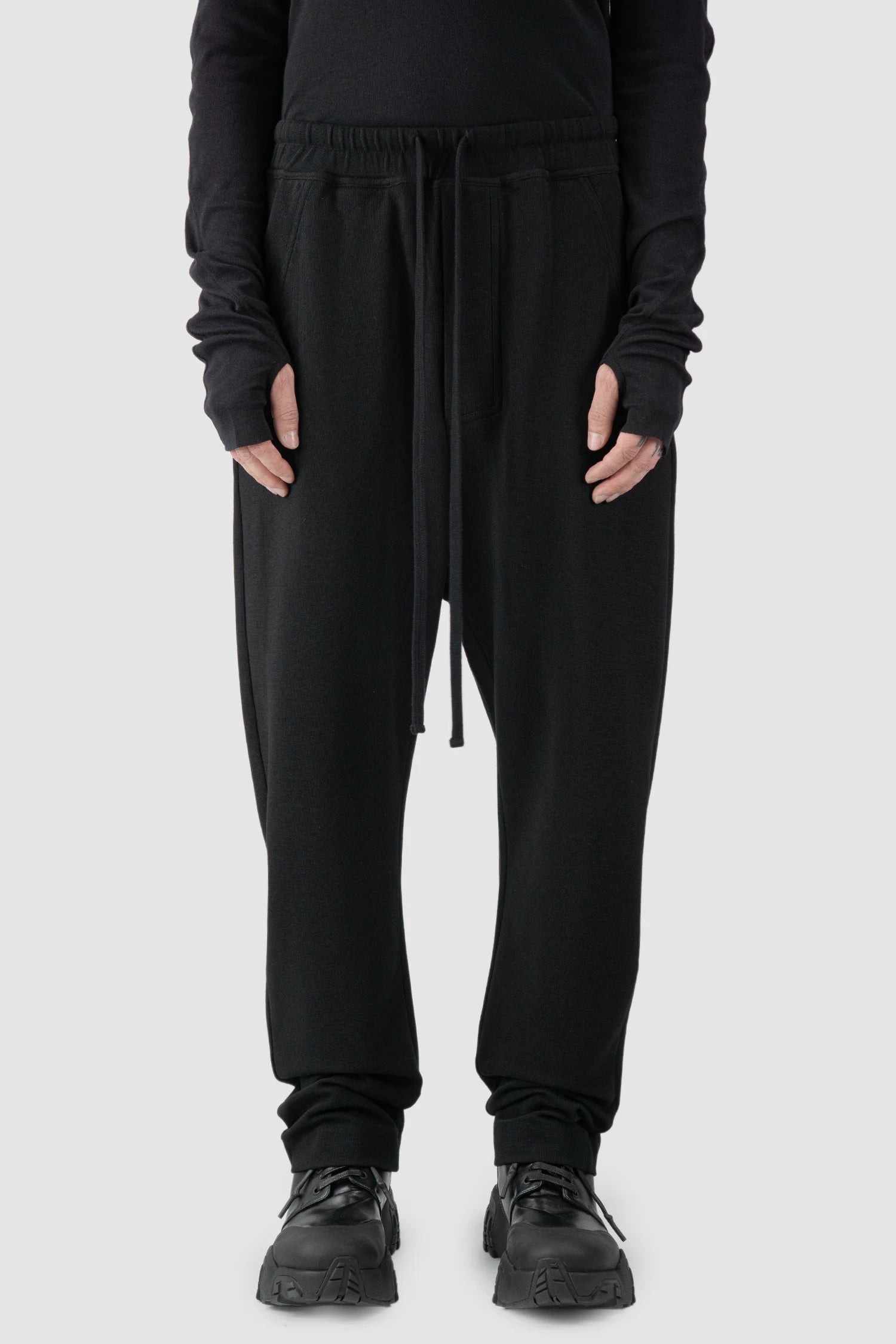 Thom Krom - model front view of black Loose Fit Straight Leg Cotton Trousers - M-ST-503