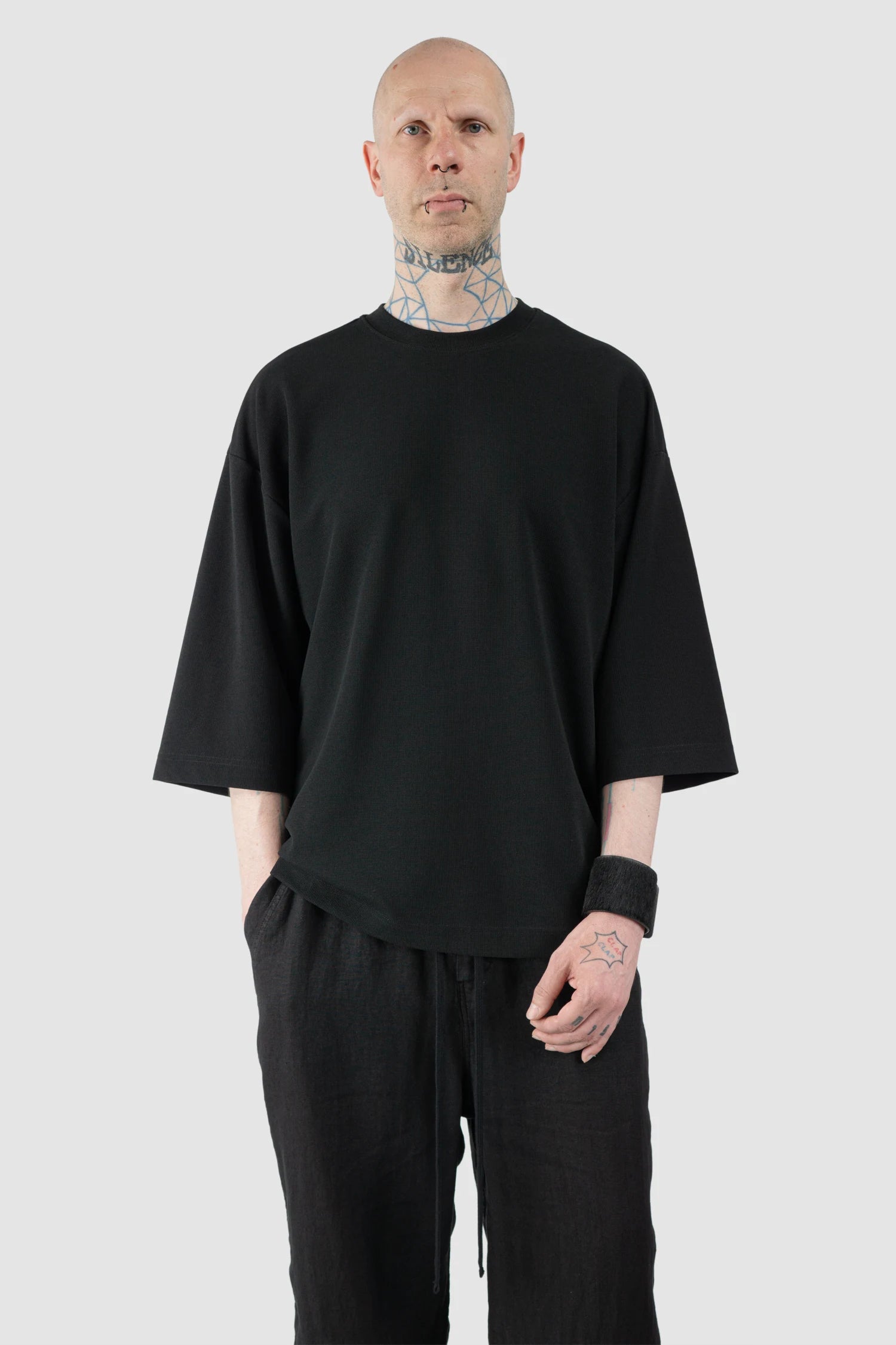 Thom Krom – Men's Black Boxy Structured Cotton T-Shirt - model relaxed view Thom Krom – Men's Black Boxy Structured Cotton T-Shirt - model relaxed view