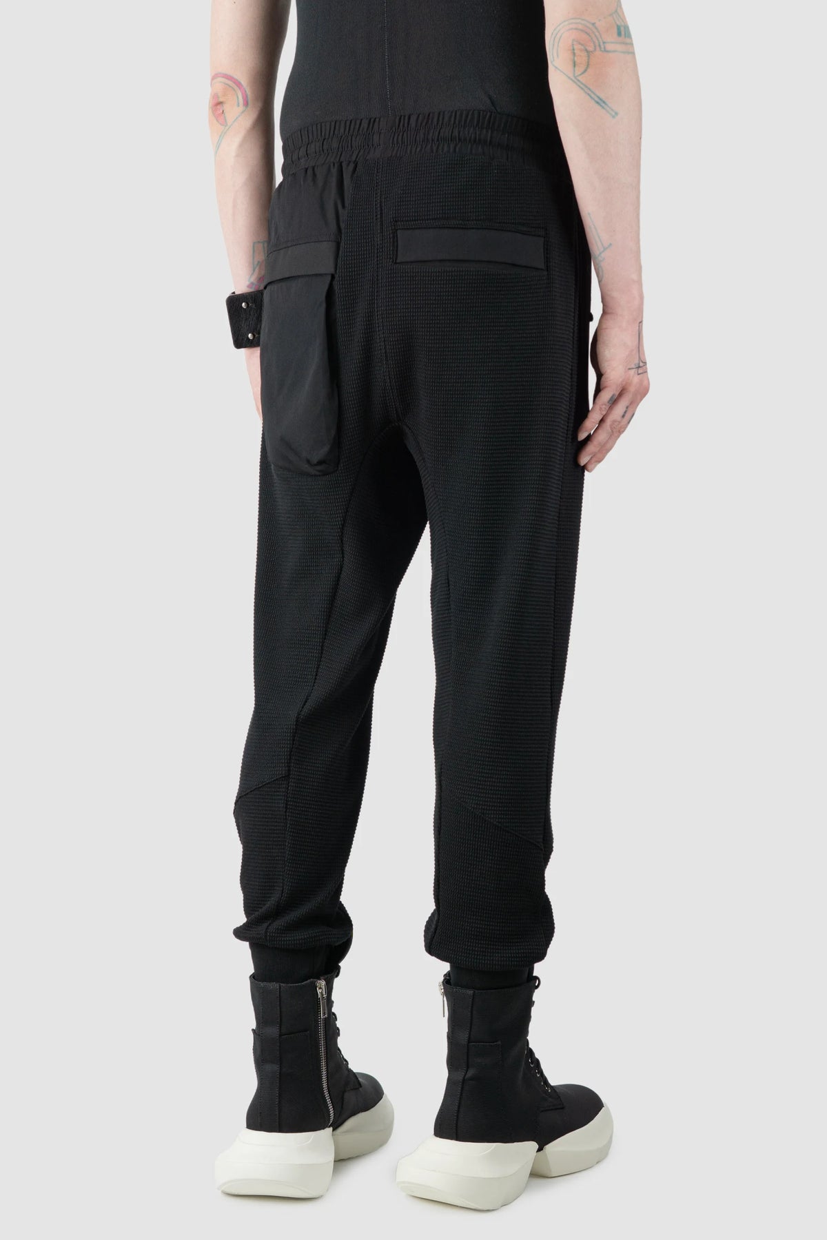 Thom/Krom - Men's Black Cotton Cargo Joggers - model back side view Thom/Krom - Men's Black Cotton Cargo Joggers - model back side view