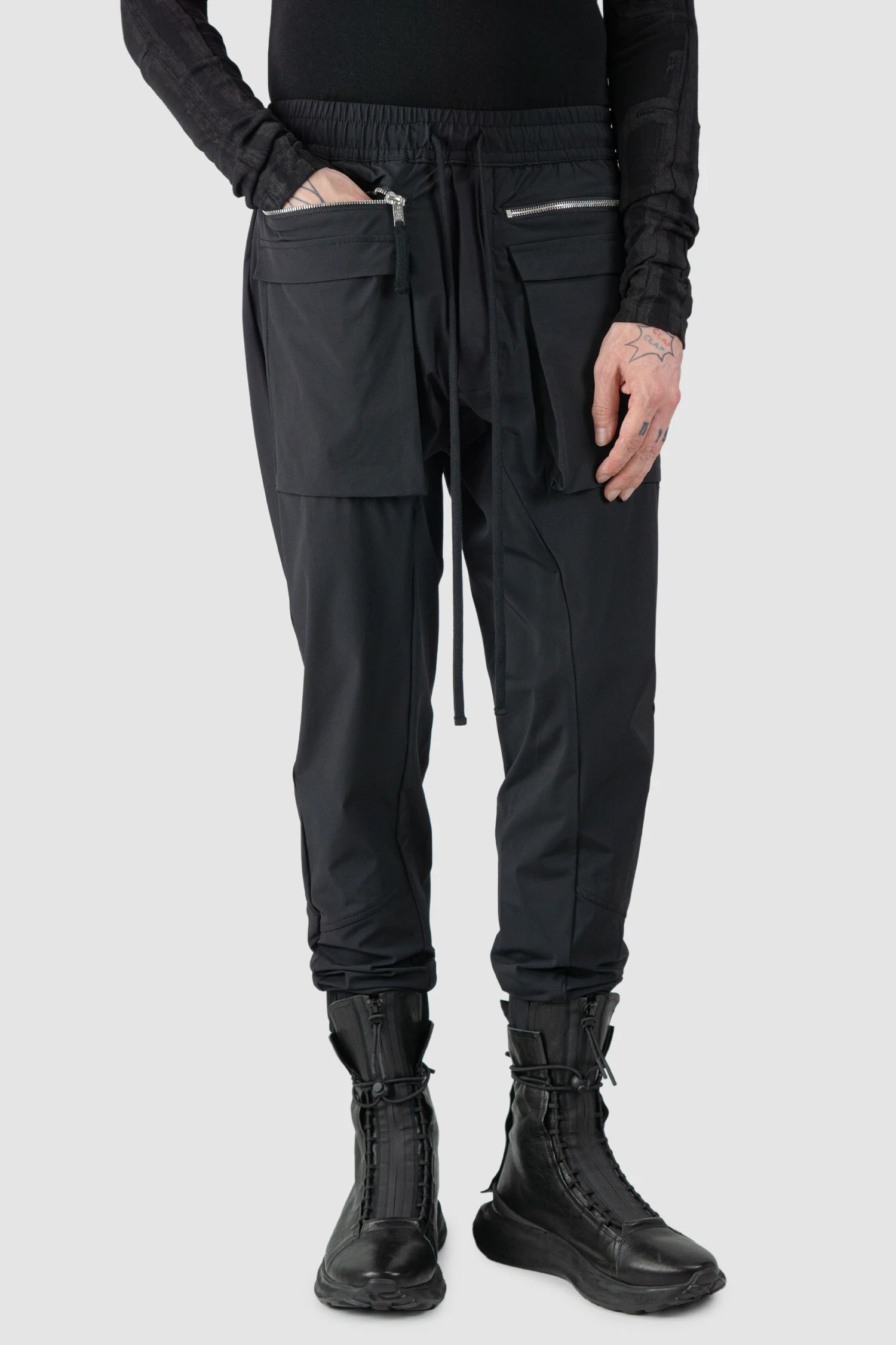 Thom Krom - model front relaxed view of men’s FW25 Black Front Pocket Woven Stretch Cargo Trousers - M-P-27