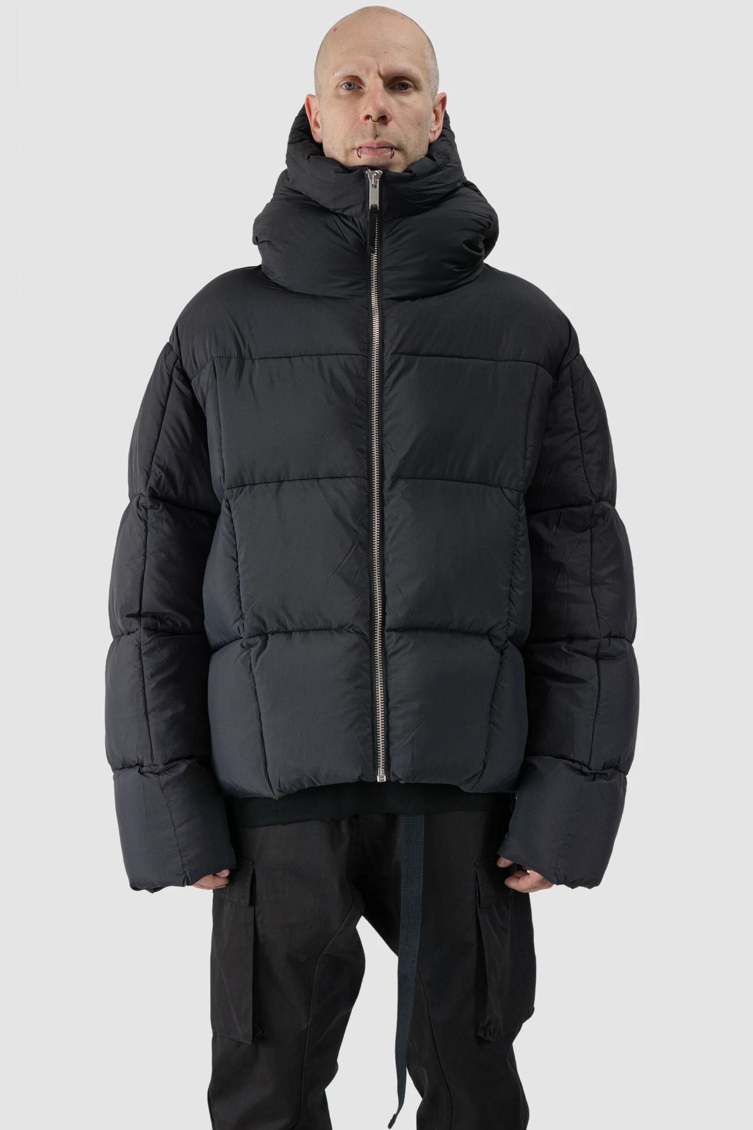 Thom Krom - model front closed view of men’s Black Guilted Nylon Puffer Jacket M-J-78