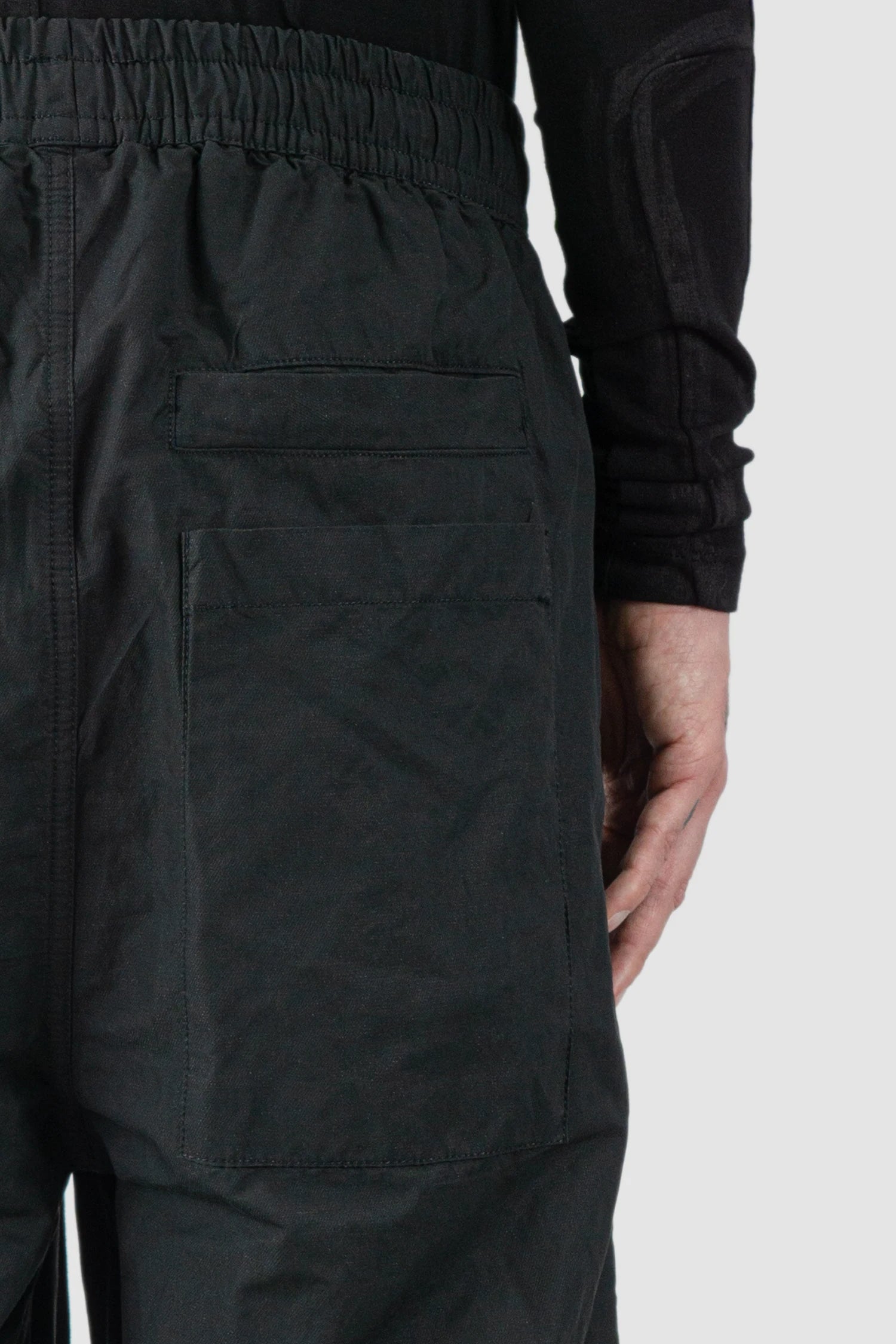 Thom Krom - model back pocket detail view of men’s FW25 Black Metallic Wide Leg Cotton Trousers - M-P-19
