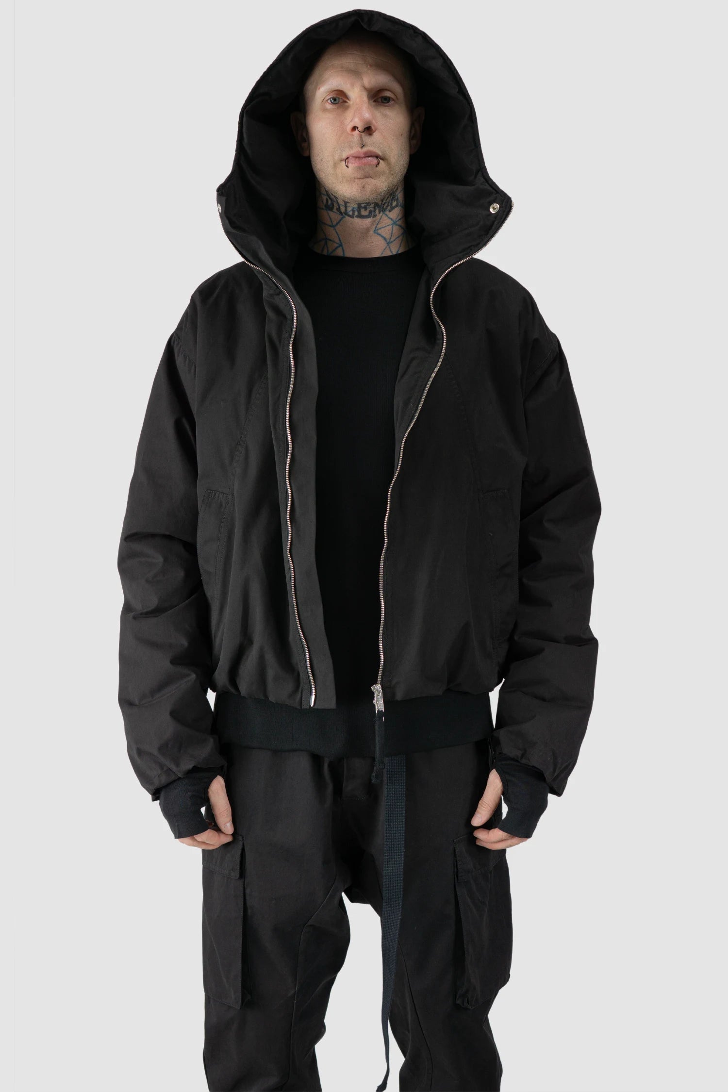 Thom Krom - model front hooded view of men’s Black Padded Short Jacket with Magnetic Buckle Hoody M-J-74