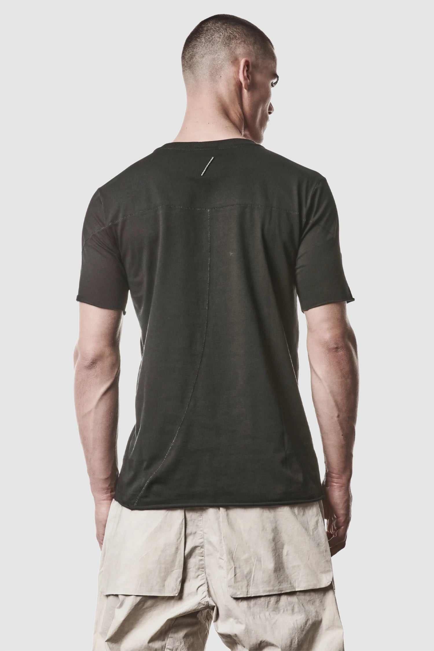 Thom Krom - model back view of men’s Black Round Neck Cotton T-Shirt