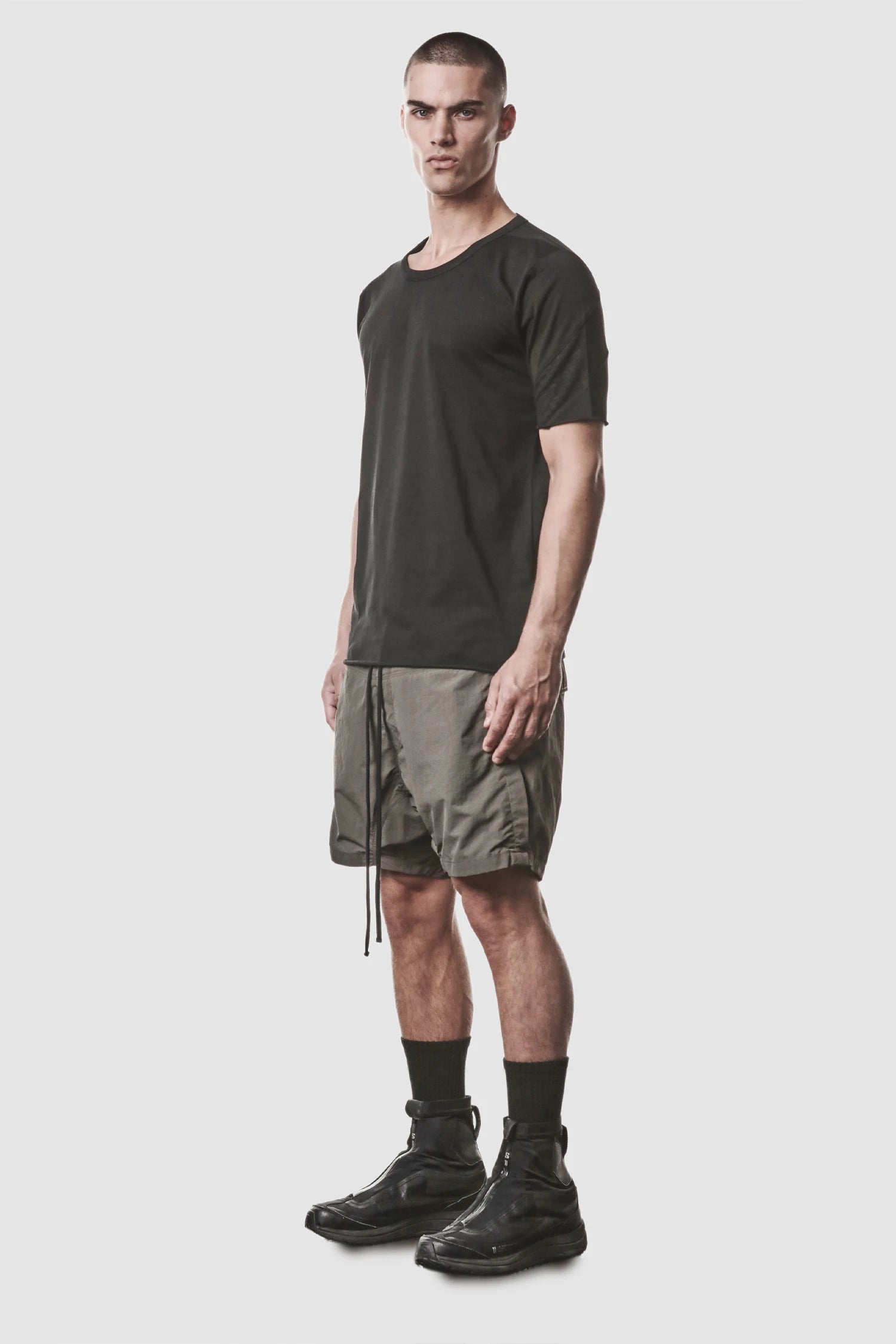 Thom Krom - model front full side view of men’s Black Shoulder Panel Cotton T-Shirt