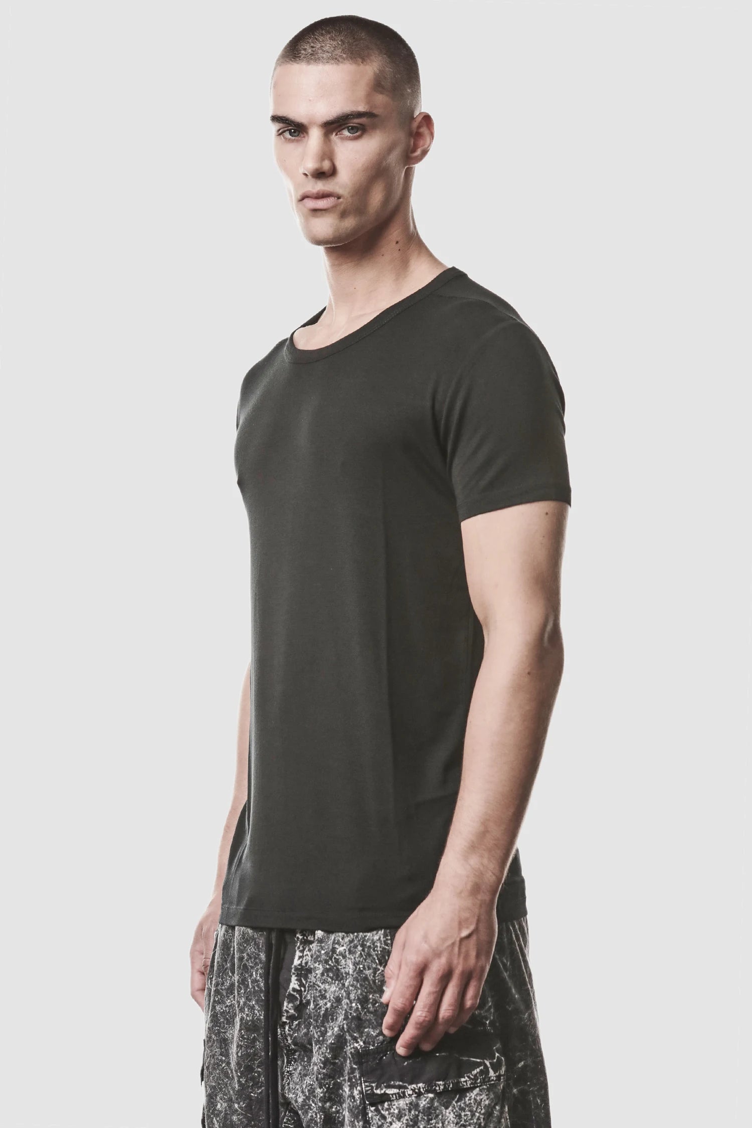 Thom Krom - model front side view of men’s Black Modal Blend Jersey T-Shirt