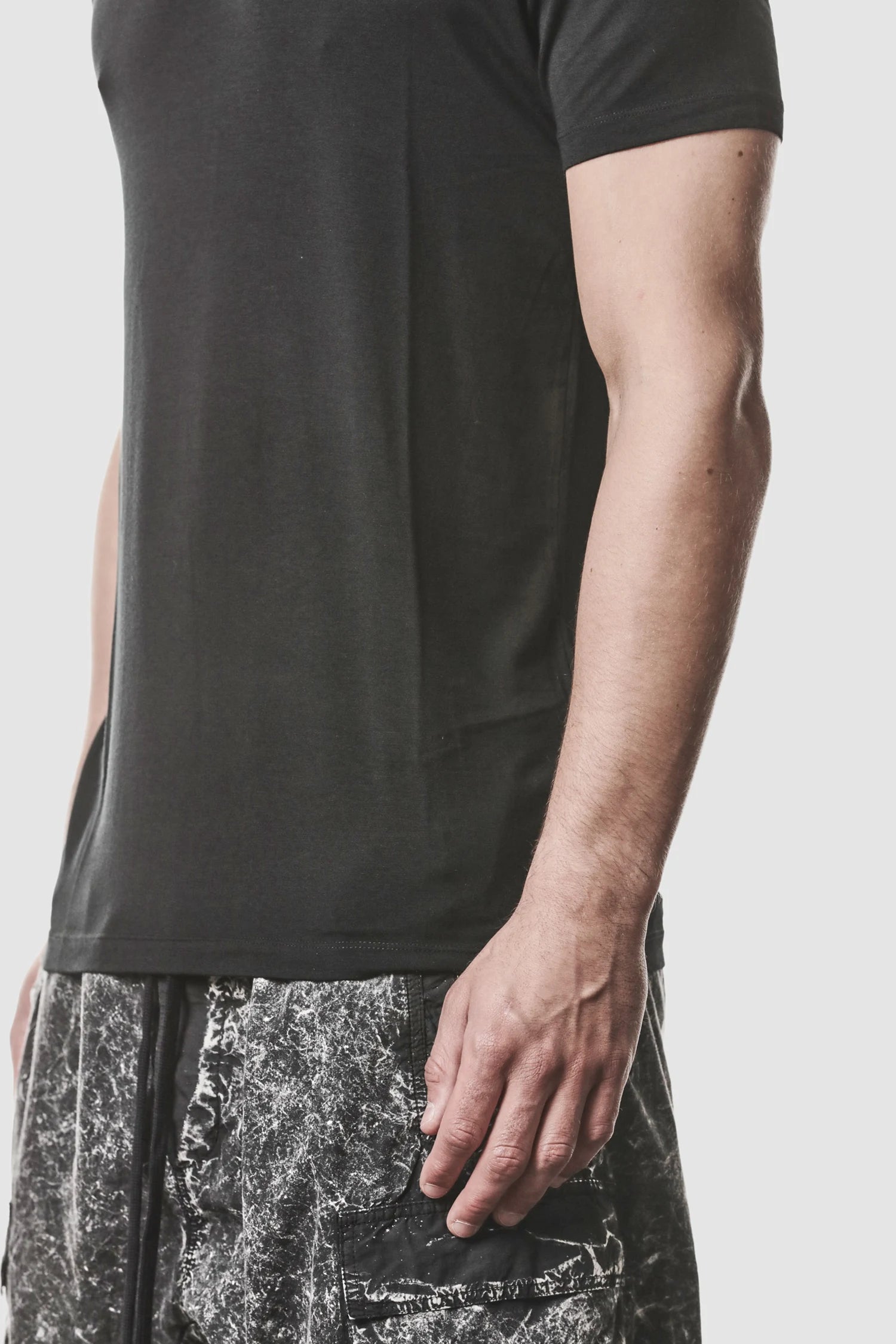 Thom Krom - model hem detail view of men’s Black Modal Blend Jersey T-Shirt