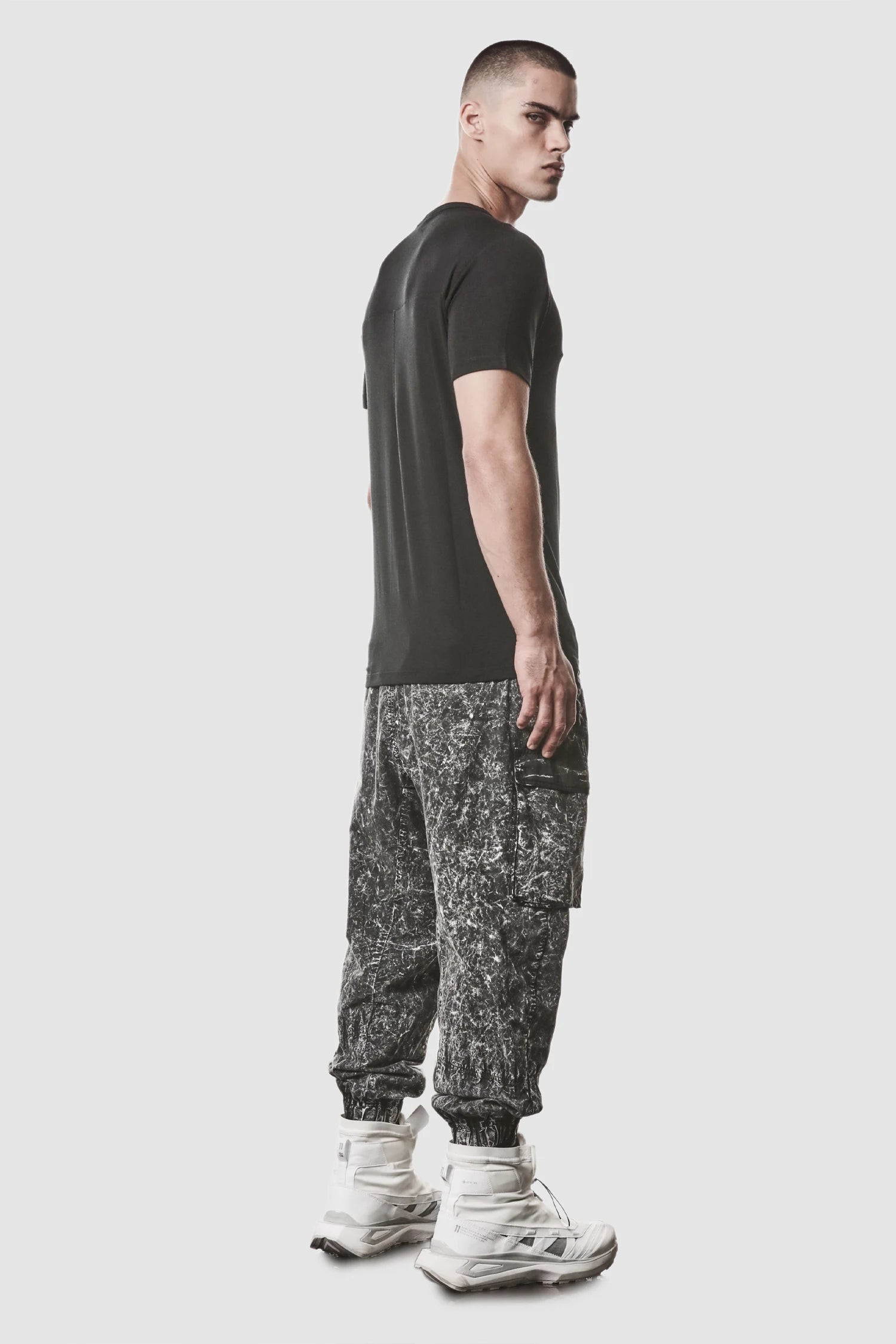 Thom Krom - model back side full view of men’s Black Modal Blend Jersey T-Shirt